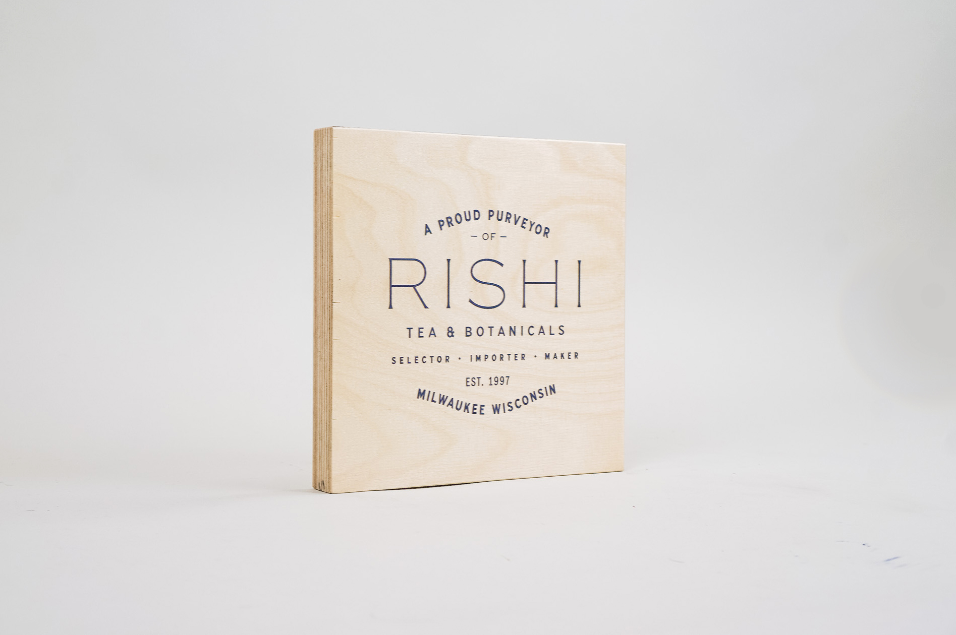 Plywood retail/cafe sign with white artwork for RIshi, a Direct Trade importer of organic teas and botanicals from the very best sources. Plywood retail/cafe sign with white artwork for RIshi, a Direct Trade importer of organic teas and botanicals from the very best sources.