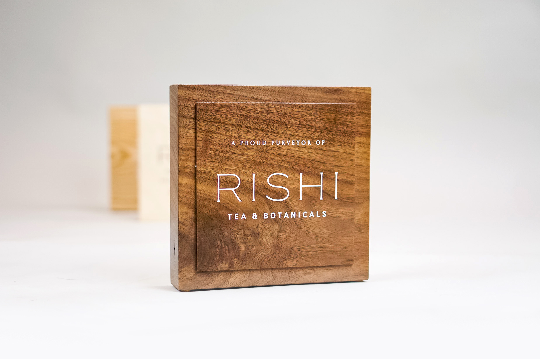 Solid walnut retail/cafe sign with white artwork for RIshi, a Direct Trade importer of organic teas and botanicals from the very best sources. Solid walnut retail/cafe sign with white artwork for RIshi, a Direct Trade importer of organic teas and botanicals from the very best sources.