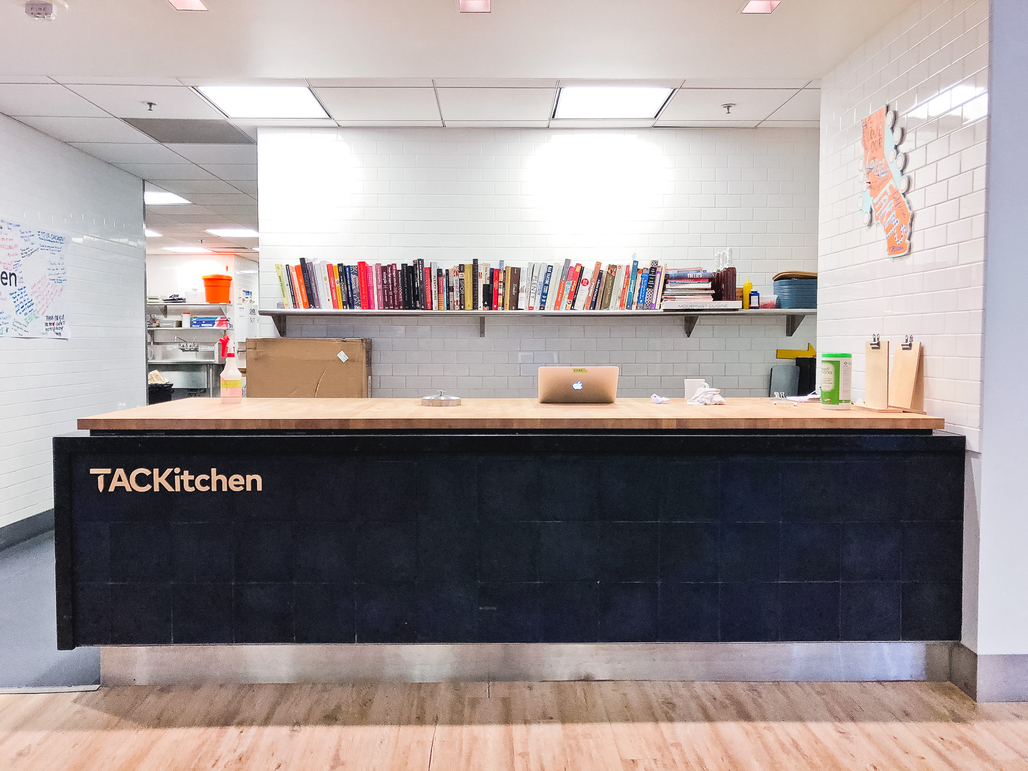 Wood letters on front counter at the cafeteria/kitchen of Thumbtack, an online service that matches customers with local professionals.