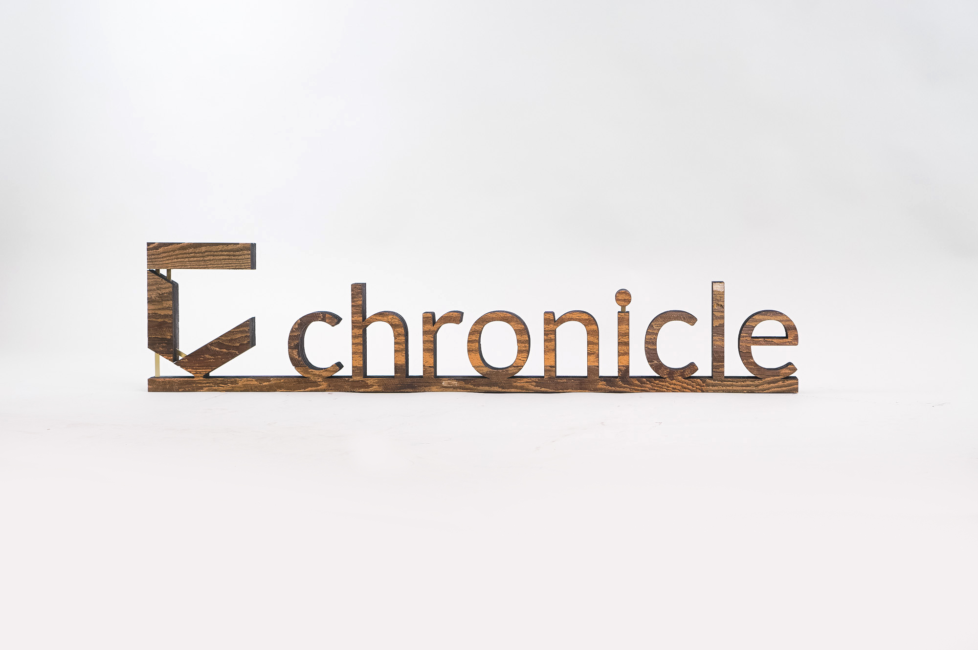 Rustic wood freestanding tabletop logo and letters for a sales conference for Chronicle Security, a cybersecurity company based in Mountain View, California. Rustic wood freestanding tabletop logo and letters for a sales conference for Chronicle Security, a cybersecurity company based in Mountain View, California.