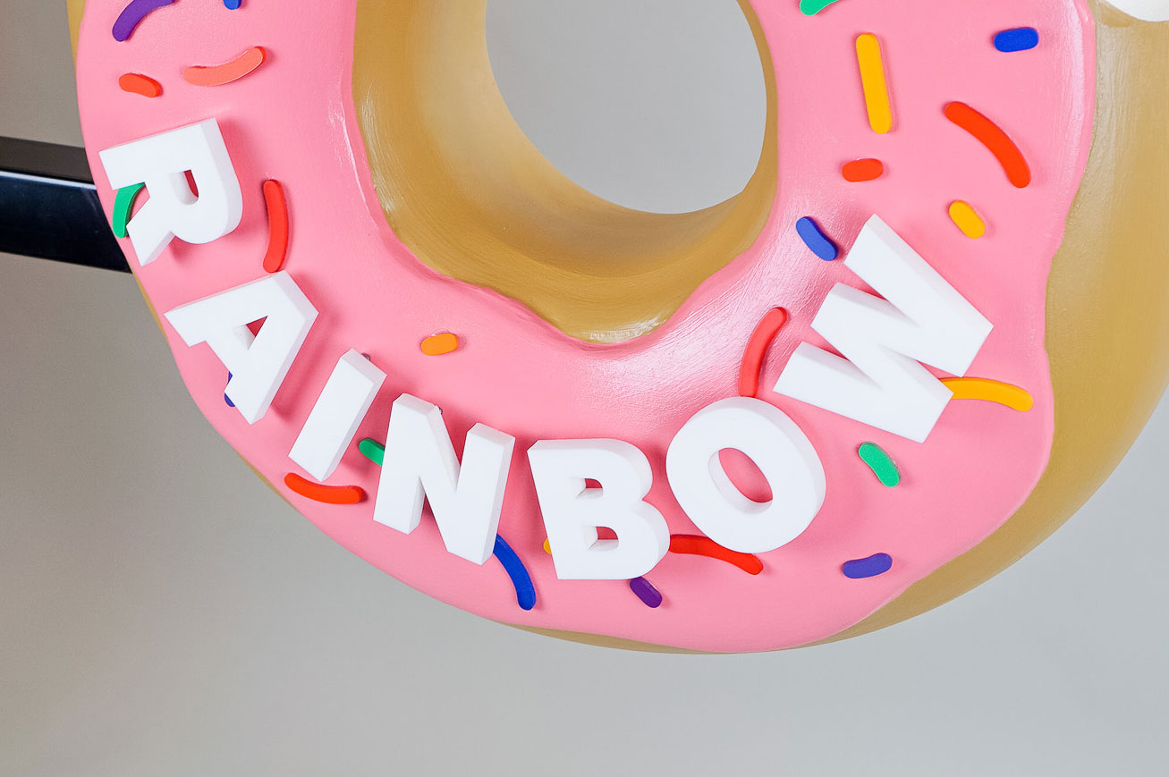 3D, pink-frosted, sculptural, sprinkle donut blade sign for Rainbow Donuts in Berkeley, CA 3D, pink-frosted, sculptural, sprinkle donut blade sign for Rainbow Donuts in Berkeley, CA