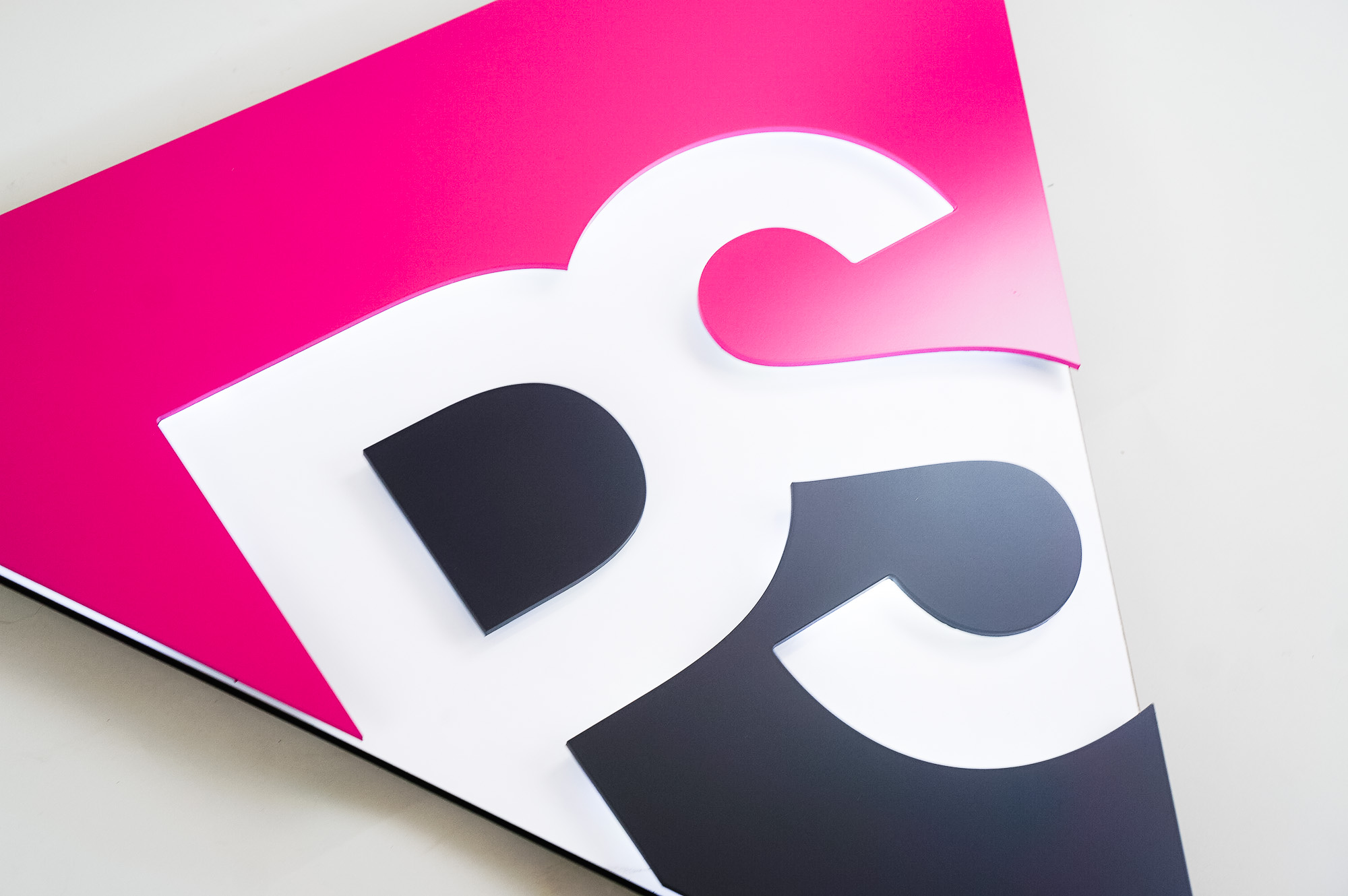 Illuminated pink and grey entrance sign for Peer Seattle, a gay and lesbian organization in Seattle, Washington Illuminated pink and grey entrance sign for Peer Seattle, a gay and lesbian organization in Seattle, Washington