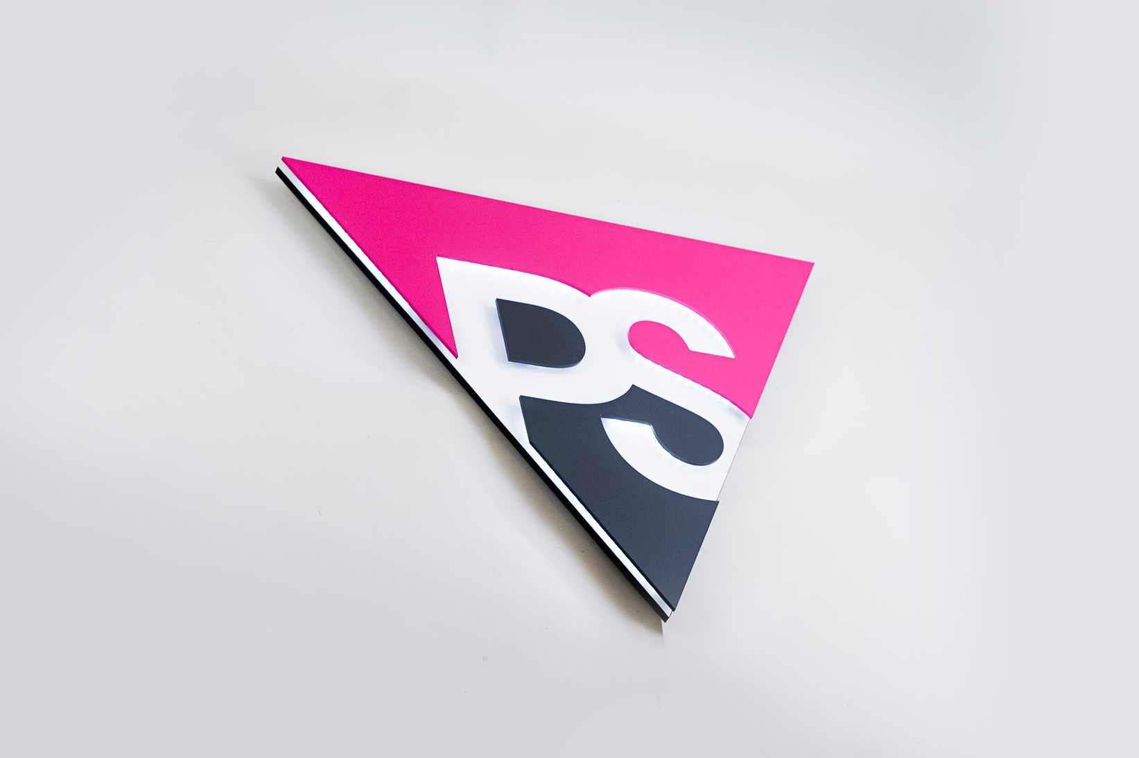 Illuminated pink and grey entrance sign for Peer Seattle, a gay and lesbian organization in Seattle, Washington Illuminated pink and grey entrance sign for Peer Seattle, a gay and lesbian organization in Seattle, Washington
