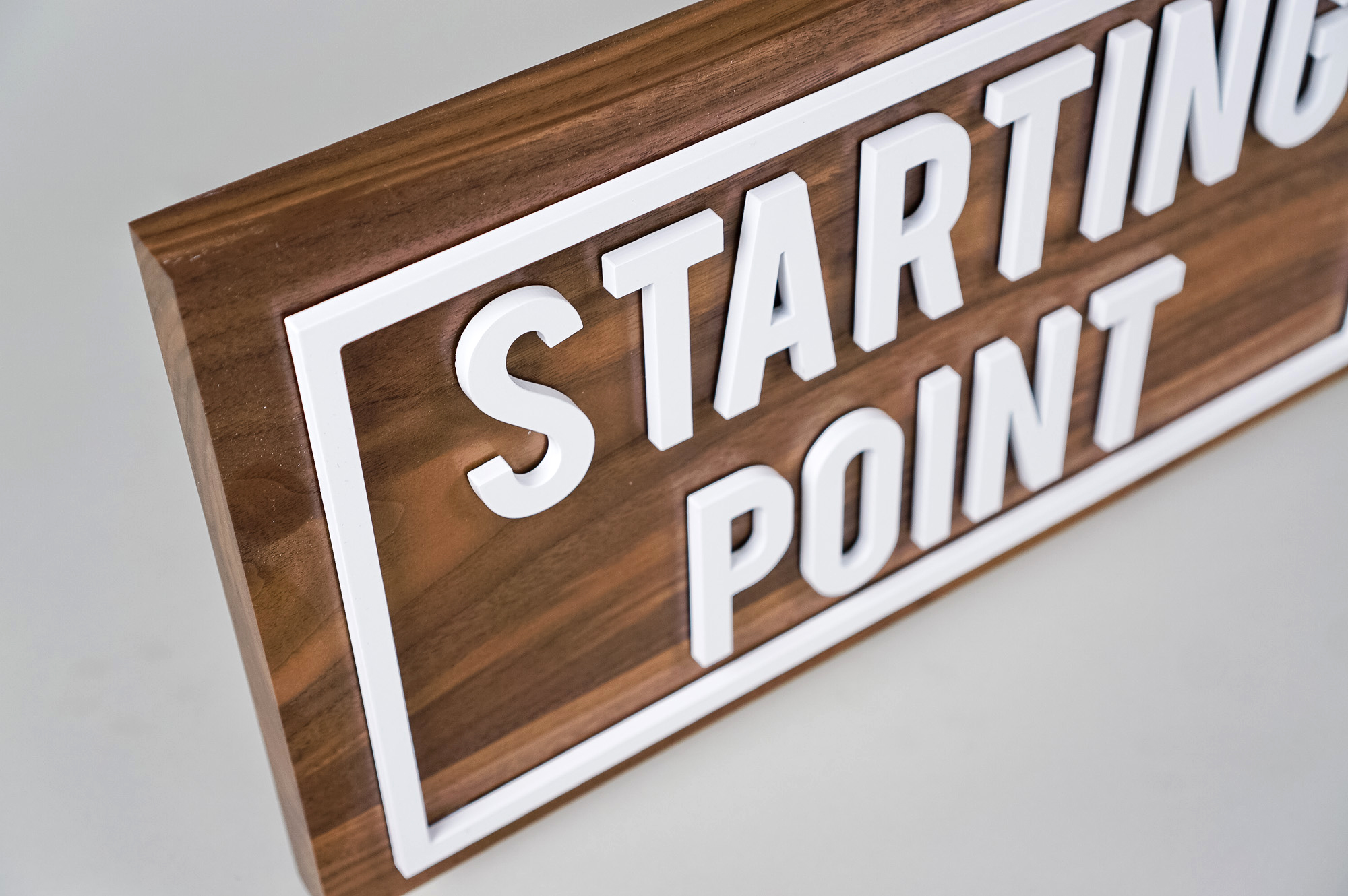 Small solid walnut and white acrylic illuminated wayfinding sign for Columbia Church, a church in Richland, WA. Small solid walnut and white acrylic illuminated wayfinding sign for Columbia Church, a church in Richland, WA.