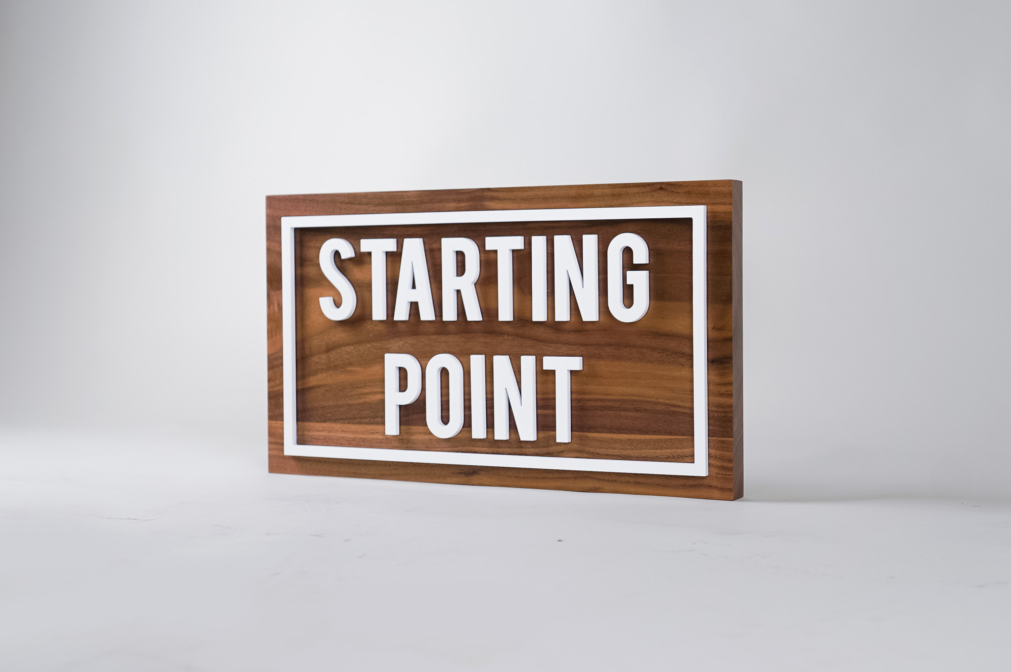 Small solid walnut and white acrylic illuminated wayfinding sign for Columbia Church, a church in Richland, WA. Small solid walnut and white acrylic illuminated wayfinding sign for Columbia Church, a church in Richland, WA.