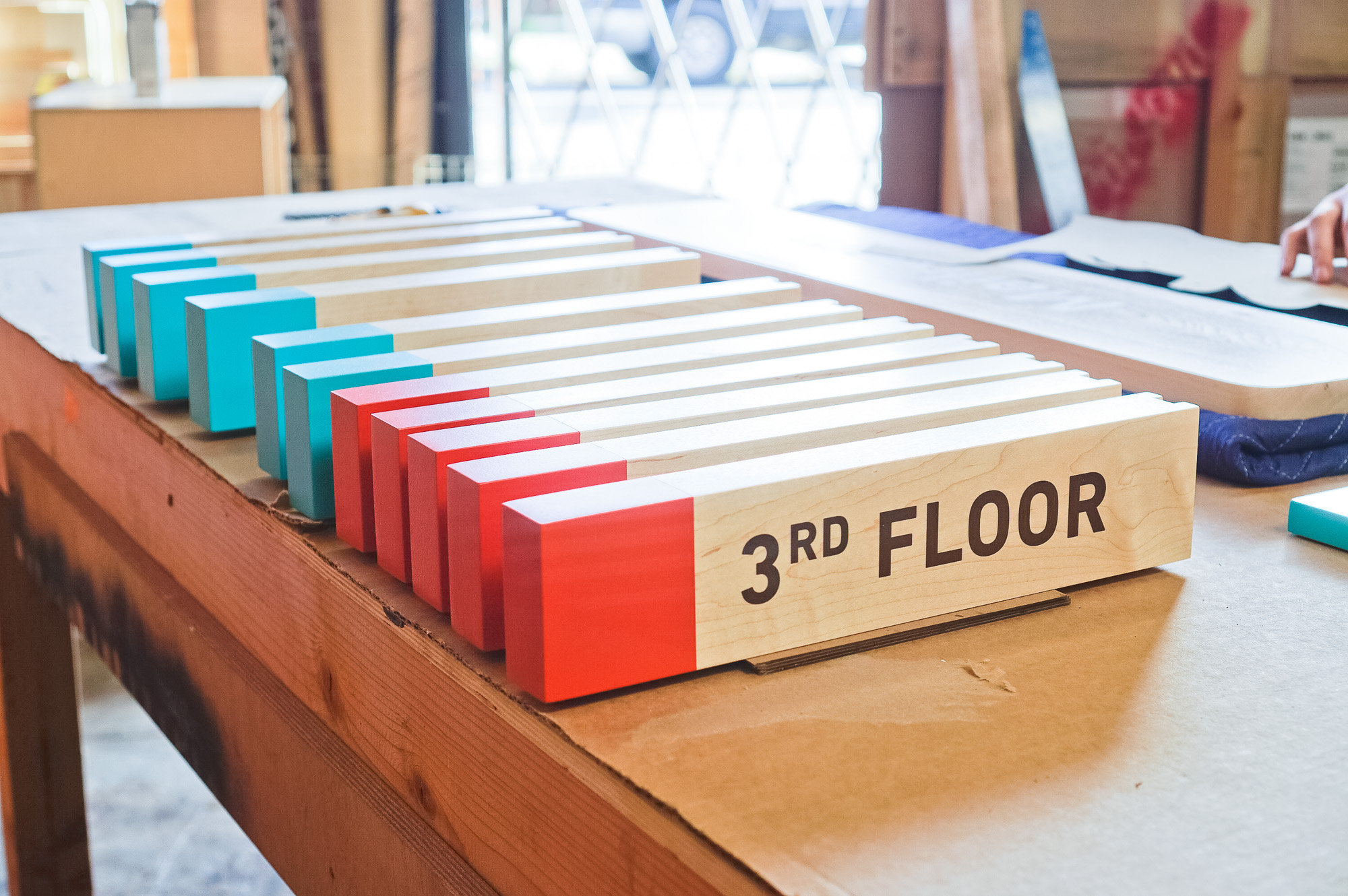 Overhead wood wayfinding signs for Biolite, a New York City based startup that develops and manufactures off-grid energy products for both the outdoor recreational industry and emerging markets. Overhead wood wayfinding signs for Biolite, a New York City based startup that develops and manufactures off-grid energy products for both the outdoor recreational industry and emerging markets.