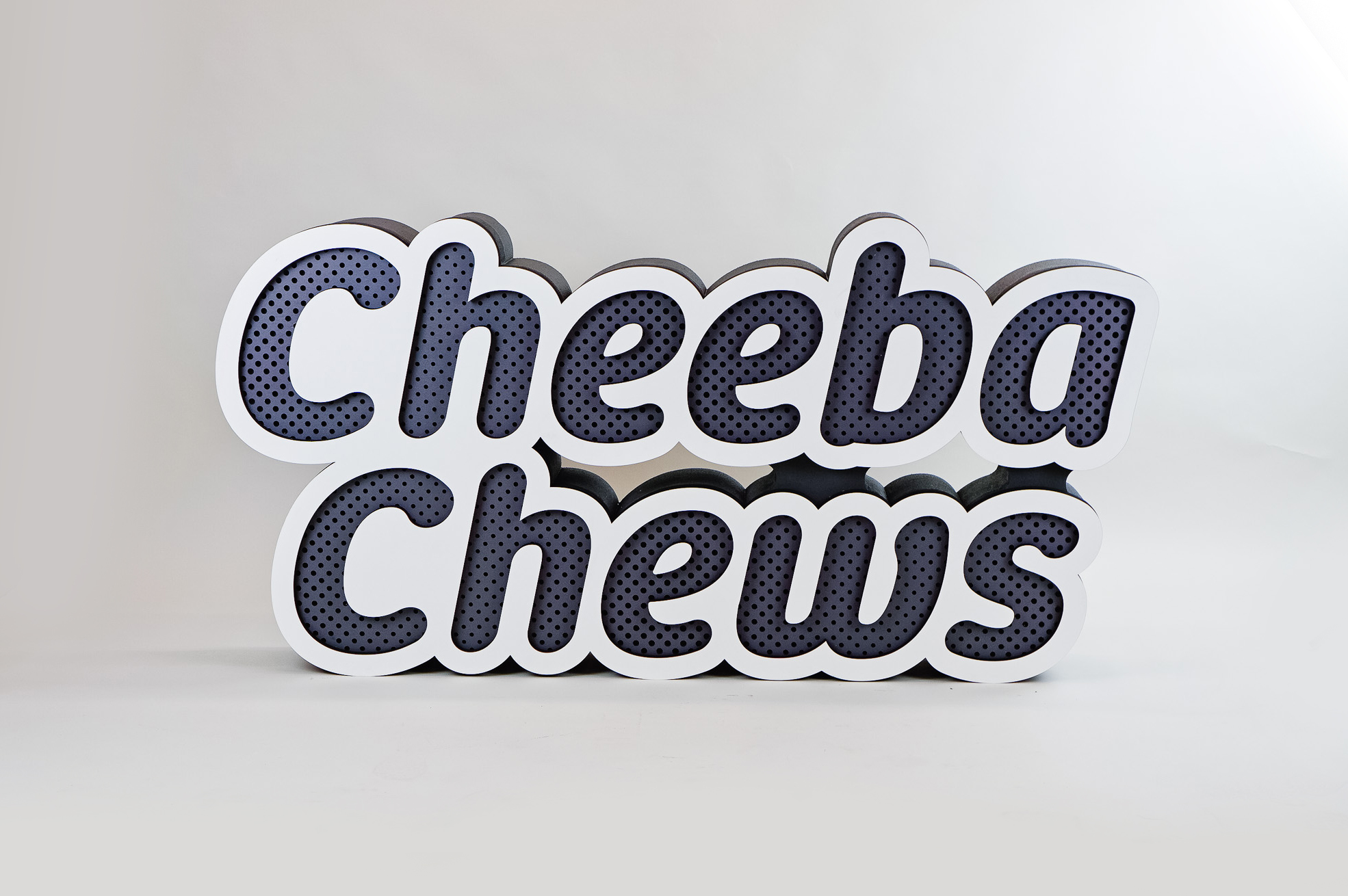 Dimensional large grey and white freestanding tradeshow floor sign for Cheeba Chews, makers of cannabis-infused edibles. Dimensional large grey and white freestanding tradeshow floor sign for Cheeba Chews, makers of cannabis-infused edibles.