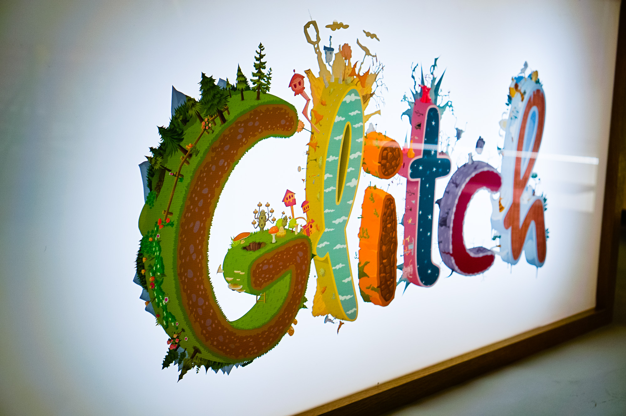 Backprinted full color lightbox sign with wood frame for Glitch, a browser-based, massively multiplayer online game—eventually becoming Slack.