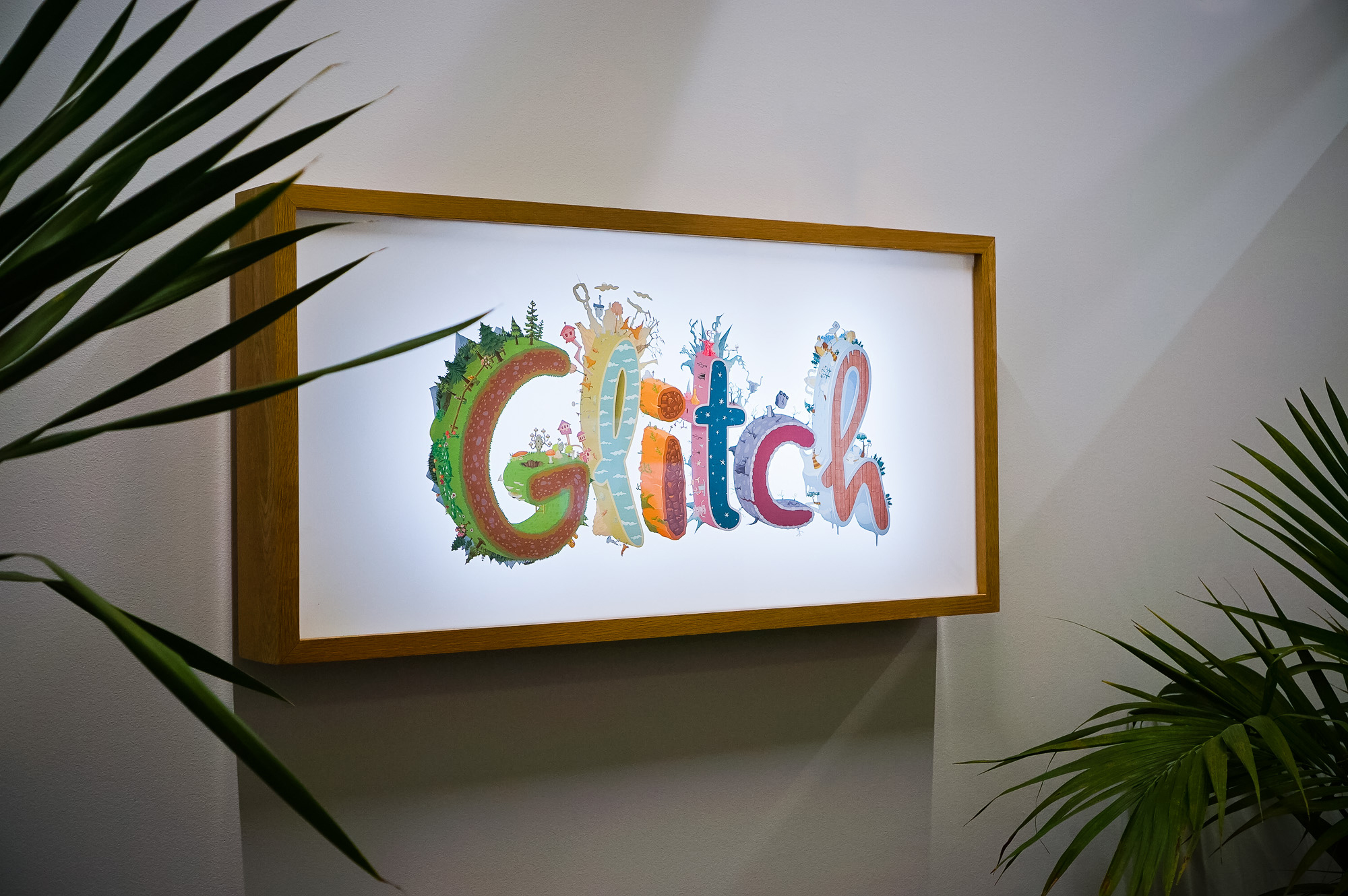 Backprinted full color lightbox sign with wood frame for Glitch, a browser-based, massively multiplayer online game—eventually becoming Slack.