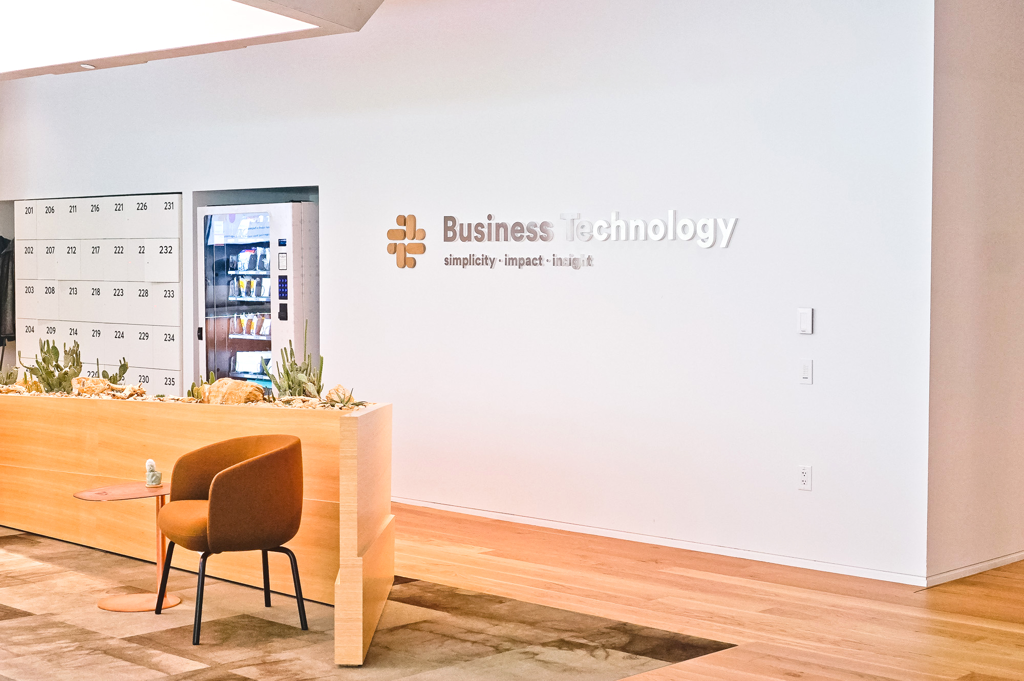 Wood and metal sign for the Business Technology department at Slack, an American cloud-based set of team collaboration tools and services. Wood and metal sign for the Business Technology department at Slack, an American cloud-based set of team collaboration tools and services.