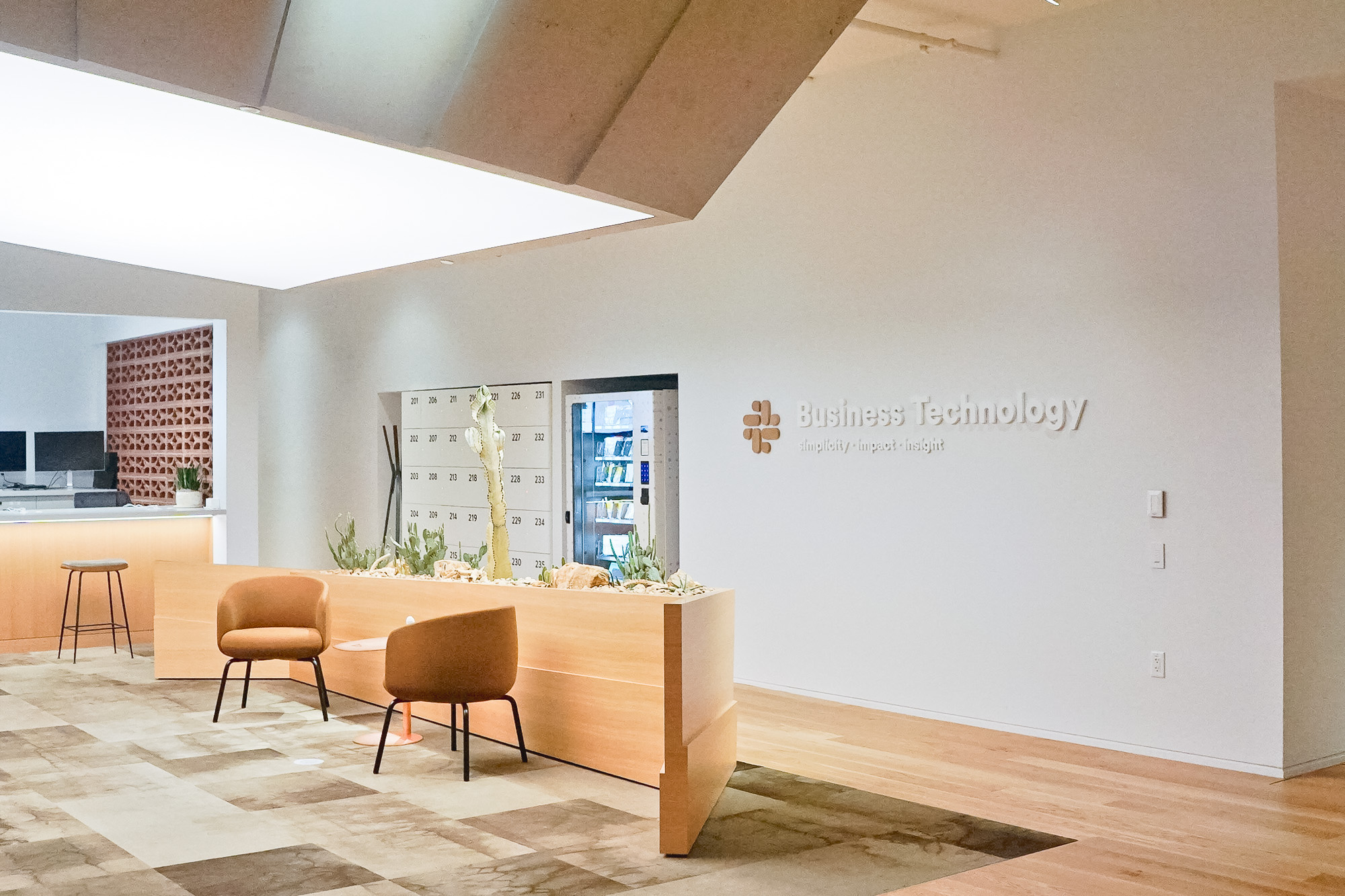 Dimensional sign with wood icon and white lettering on a white wall at the San Francisco office of Slack, an American cloud-based set of proprietary team collaboration tools and services. Dimensional sign with wood icon and white lettering on a white wall at the San Francisco office of Slack, an American cloud-based set of proprietary team collaboration tools and services.