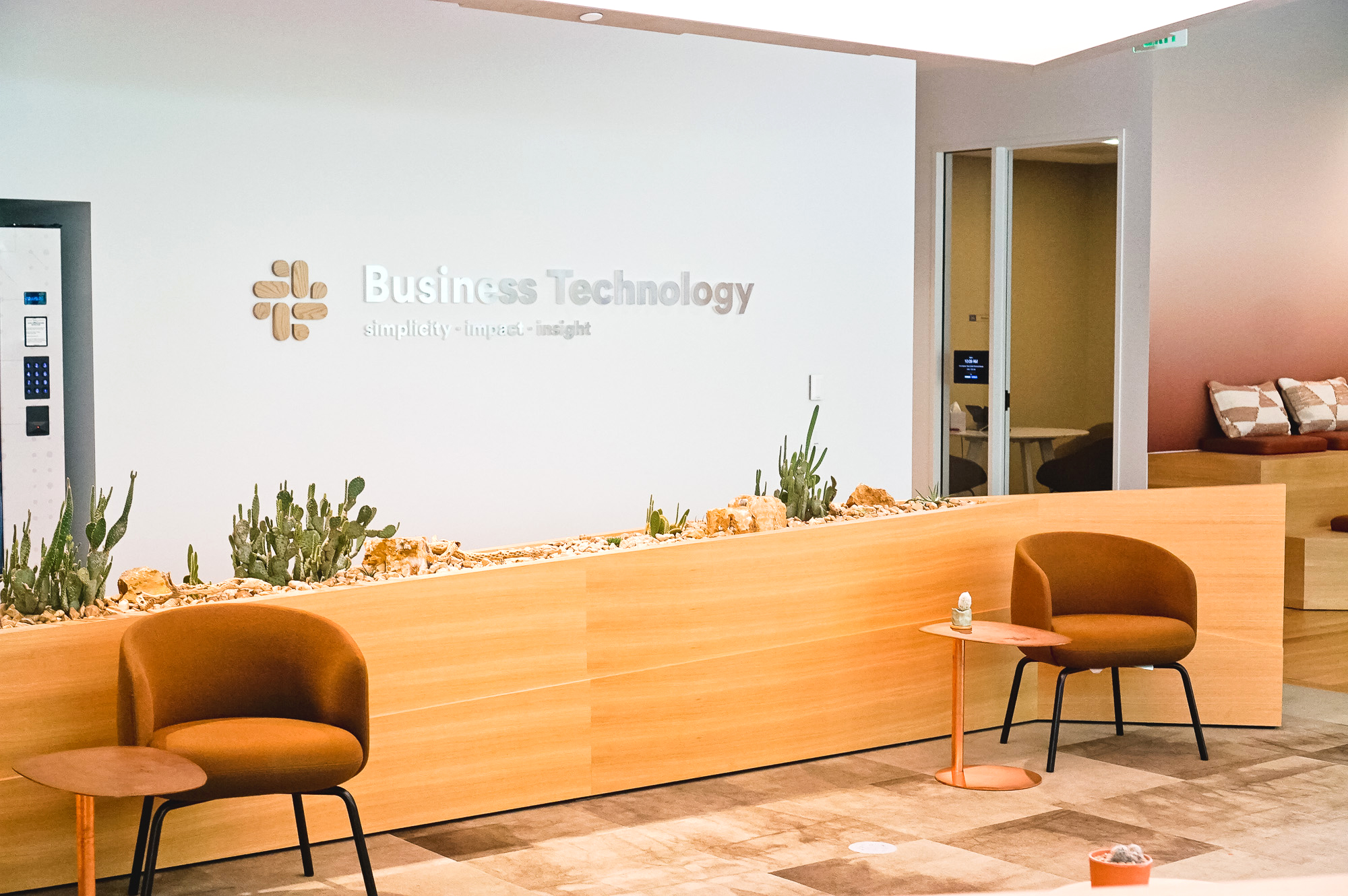 Wood and metal sign for the Business Technology department at Slack, an American cloud-based set of team collaboration tools and services. Wood and metal sign for the Business Technology department at Slack, an American cloud-based set of team collaboration tools and services.