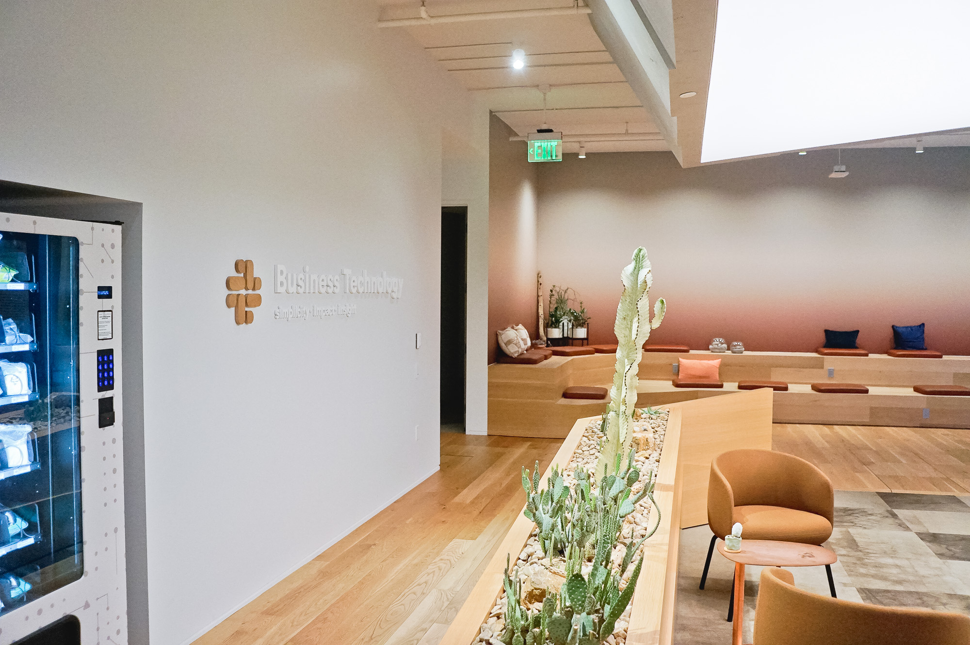 Dimensional sign with wood icon and white lettering on a white wall at the San Francisco office of Slack, an American cloud-based set of proprietary team collaboration tools and services. Dimensional sign with wood icon and white lettering on a white wall at the San Francisco office of Slack, an American cloud-based set of proprietary team collaboration tools and services.