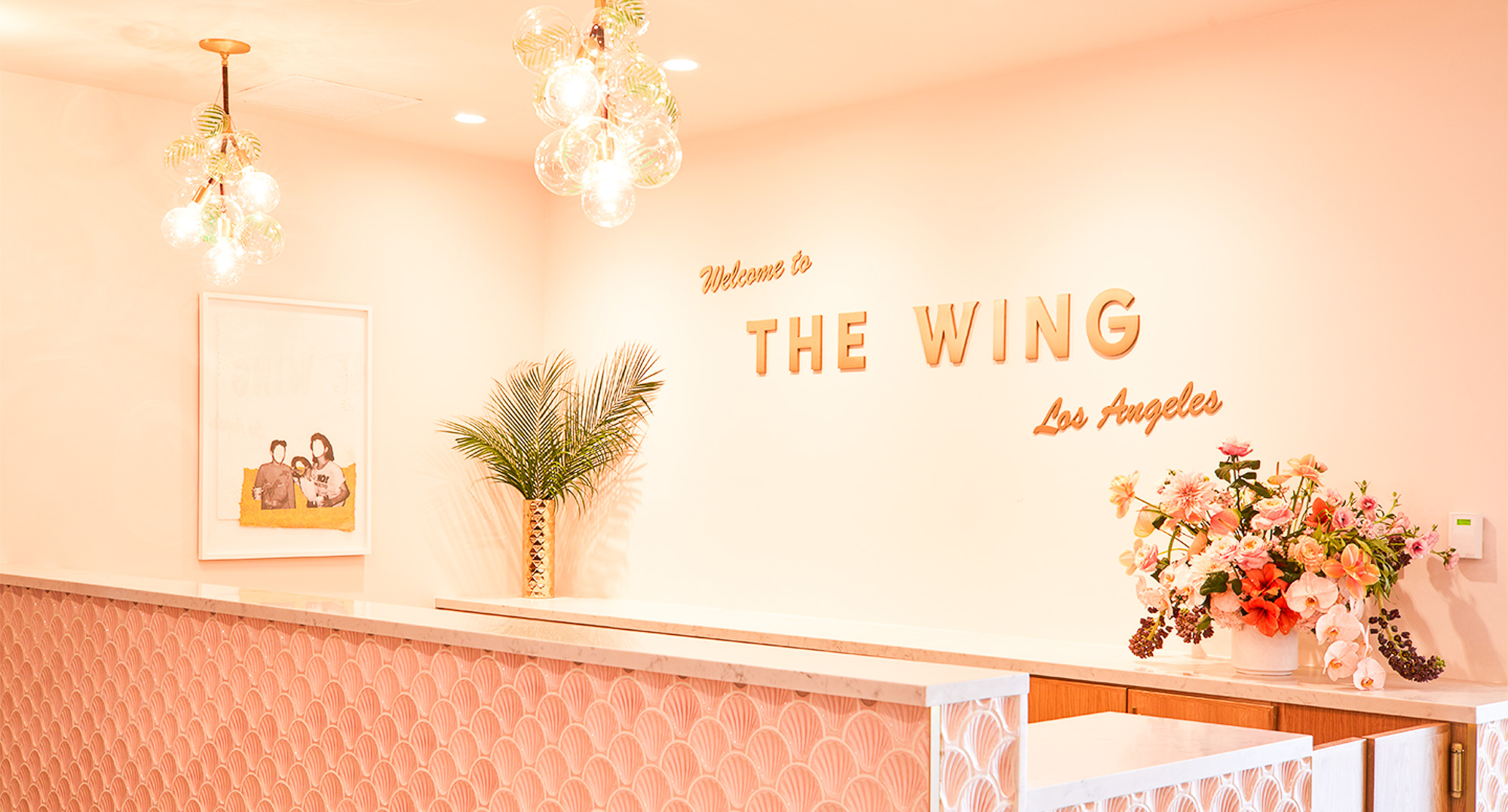 Retro, brass colored sign made from brushed, solid bronze for The Wing, a co-working space in Los Angeles.