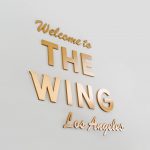 Retro, brass colored sign made from brushed, solid bronze for The Wing, a co-working space in Los Angeles.