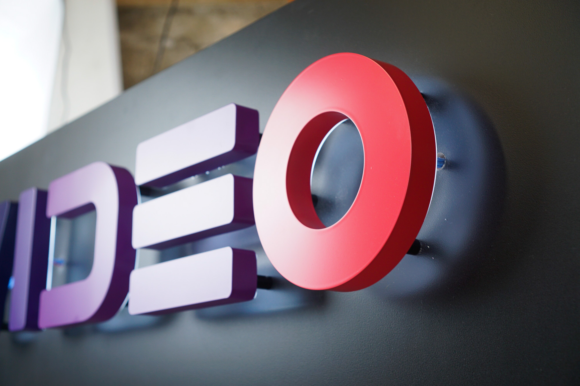 Halo-lit, retro-style, portable “VIDEO” sign with gradient for Facebook, an American online social media and social networking service company. Halo-lit, retro-style, portable