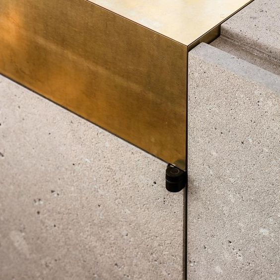 brass and concrete