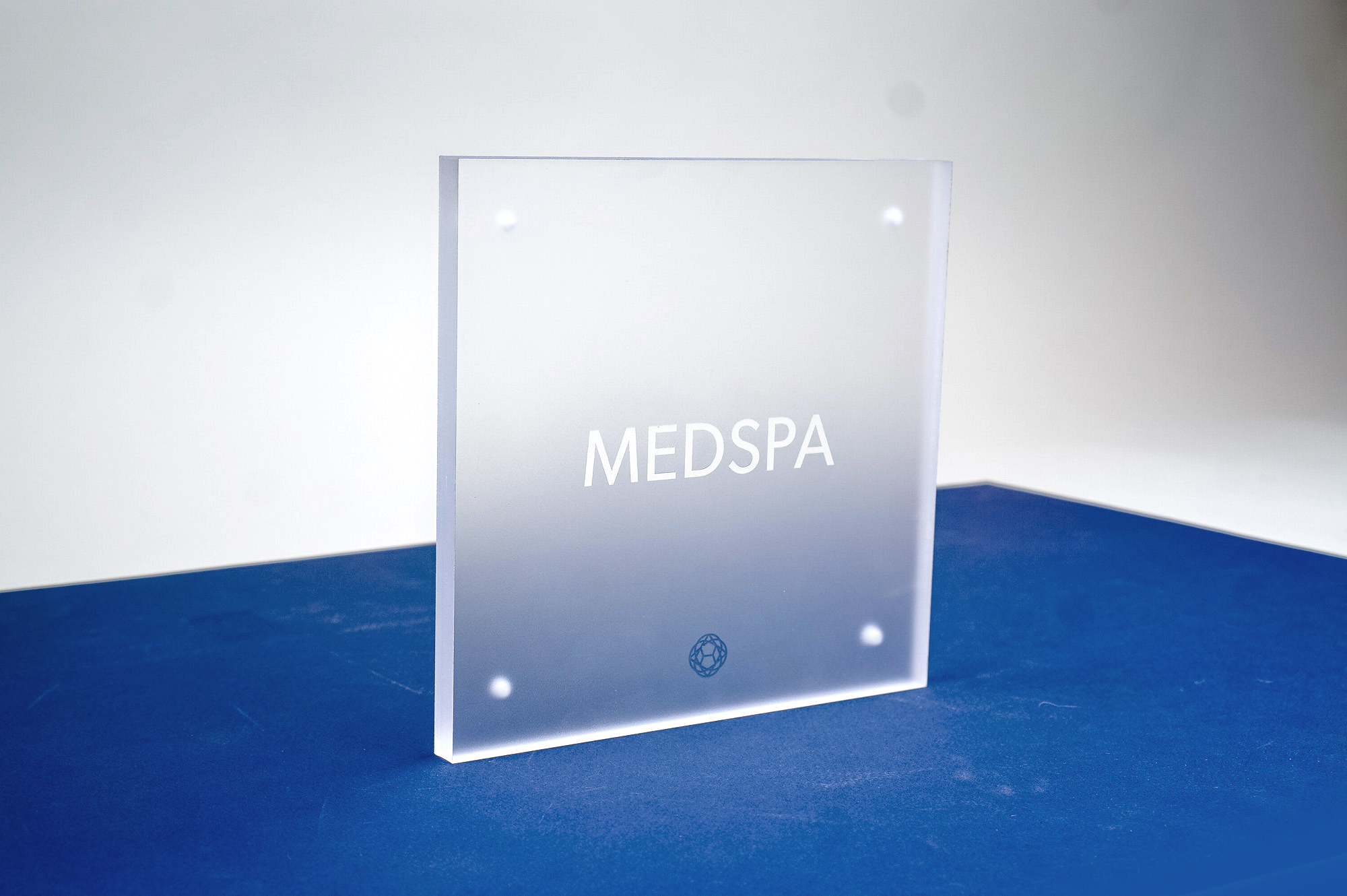 Frosted room sign with glossy clear ink for Nexus Club, Nexus Club, a private social and business club in New York. Frosted room sign with glossy clear ink for Nexus Club, Nexus Club, a private social and business club in New York.