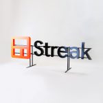 Freestanding cutout logo on a shelf at the entrance of Streak, a San Francisco based relationship management platform for Gmail.