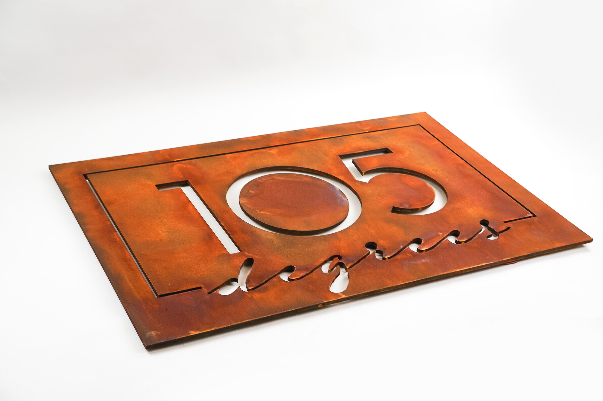 Rusted metal illuminated sign for 105 Degrees, a hot yoga studio at Newtown Athletic Club, a premiere family fitness and wellness center serving residents of Newtown, PA Rusted metal illuminated sign for 105 Degrees, a hot yoga studio at Newtown Athletic Club, a premiere family fitness and wellness center serving residents of Newtown, PA