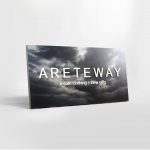Exterior sign with black and white photo and raised white letters for Areteway, a clothing and gift boutique in Santa Rosa, CA.
