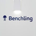 Navy blue sign on white wall in the elevator vestibule of Benchling, a San Francisco based company working on a unified platform to accelerate, measure, and forecast R&D from discovery through bioprocessing.