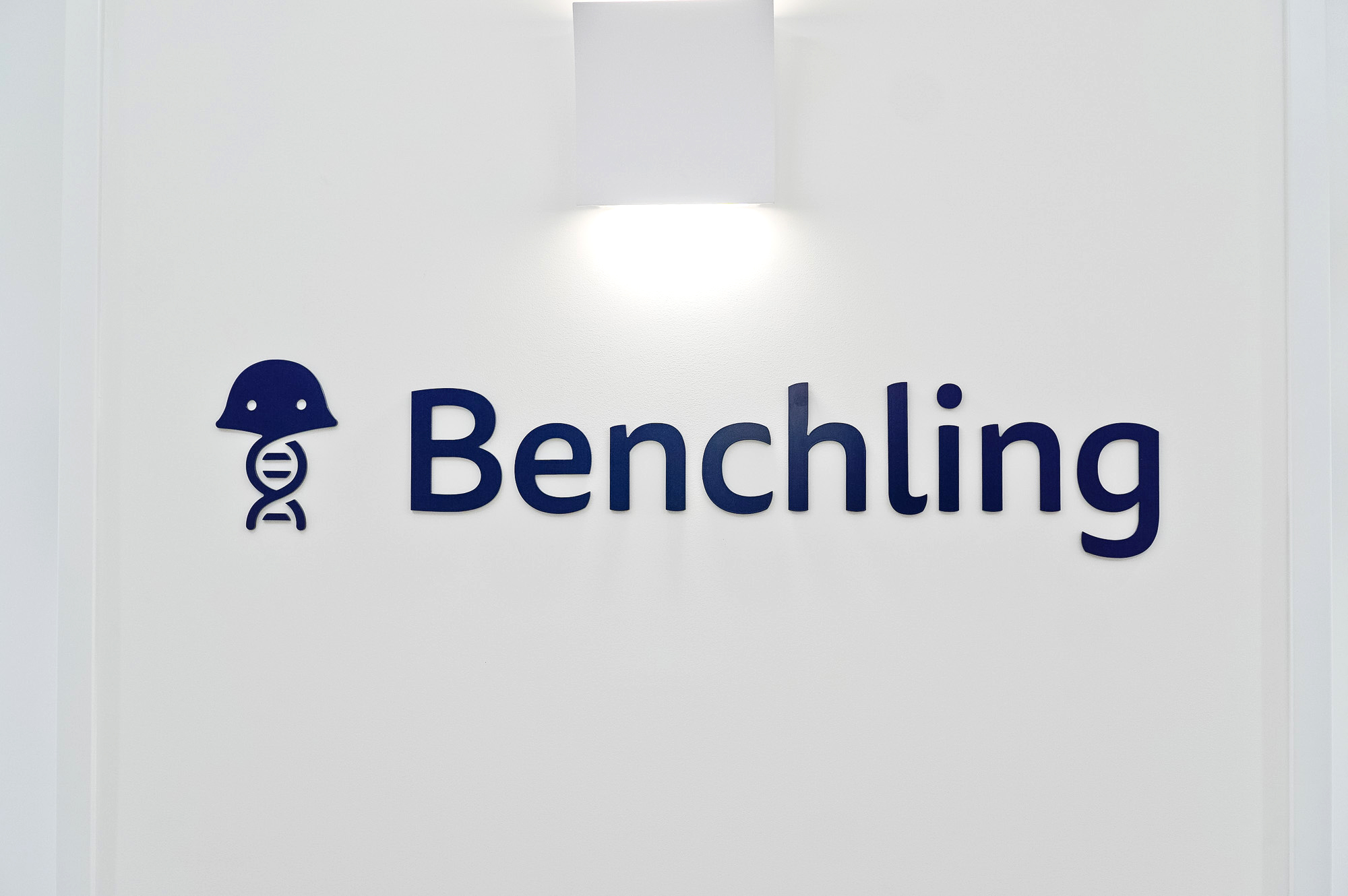 Navy blue sign on white wall in the elevator vestibule of Benchling, a San Francisco based company working on a unified platform to accelerate, measure, and forecast R&D from discovery through bioprocessing. Navy blue sign on white wall in the elevator vestibule of Benchling, a San Francisco based company working on a unified platform to accelerate, measure, and forecast R&D from discovery through bioprocessing.