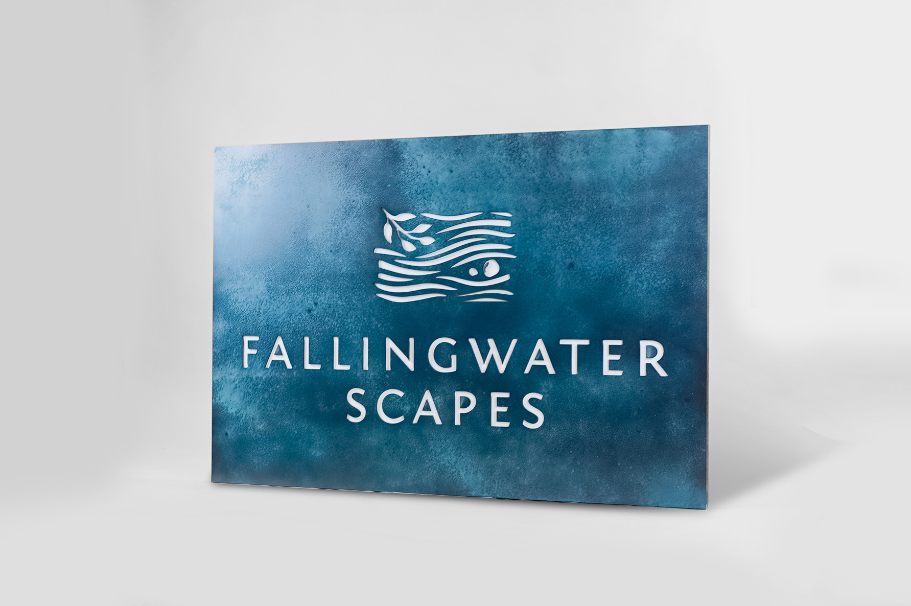 Blue-hued, rusted bronze/brass/copper patina style sign for FallingWater Scapes, a water feature design, construction and maintenance company in Dover, MA. Blue-hued, rusted bronze/brass/copper patina style sign for FallingWater Scapes, a water feature design, construction and maintenance company in Dover, MA.