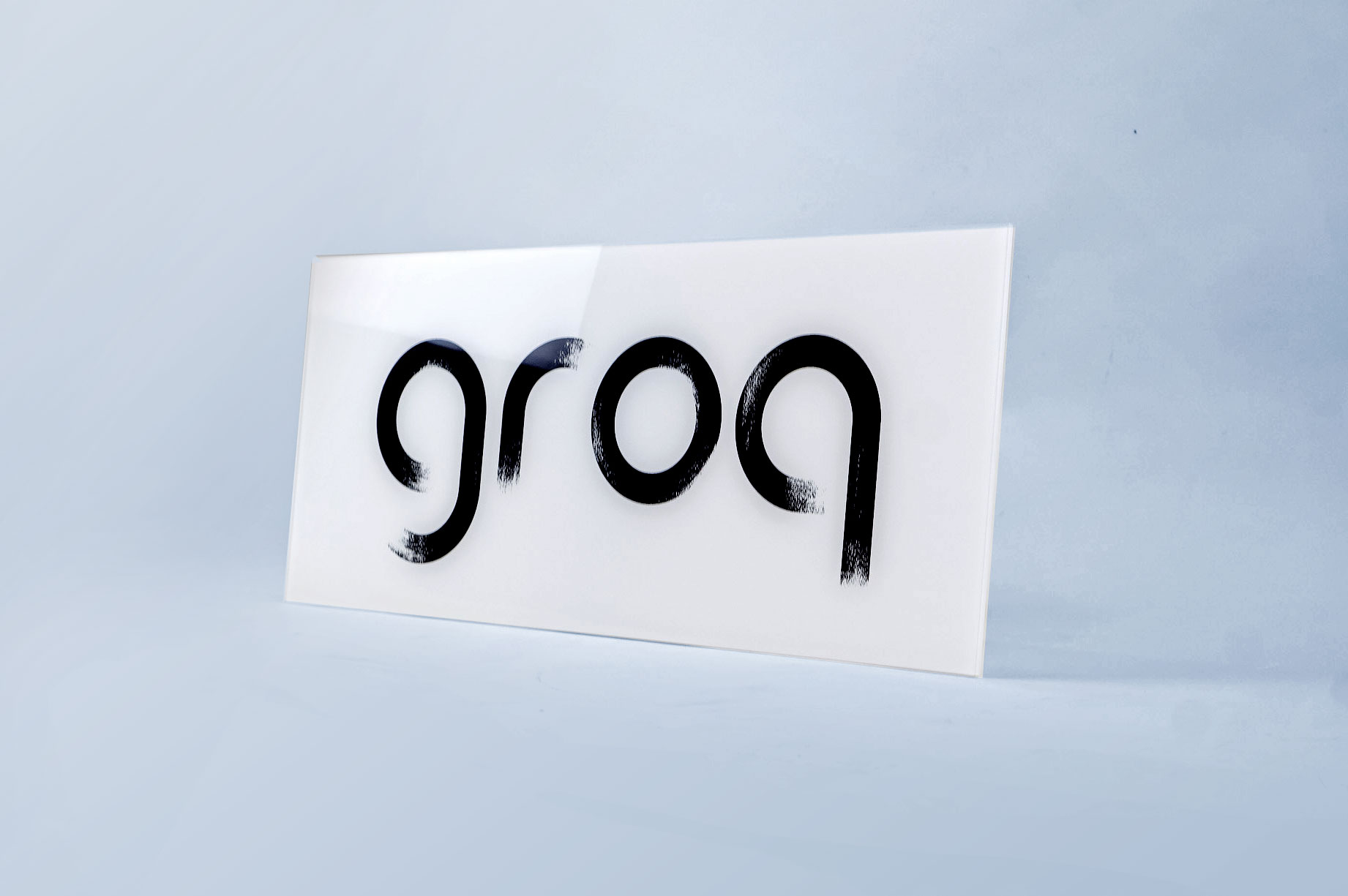 Glassy black and white sign with black brushstroke logo for Groq, a Palo Alto based company developing an integrated circuit developed specifically for machine learning. Glassy black and white sign with black brushstroke logo for Groq, a Palo Alto based company developing an integrated circuit developed specifically for machine learning.