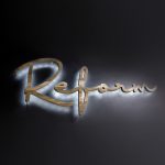 Reclaimed wood illuminated script sign for Reform, a fitness studio at Newtown Athletic Club, a premiere family fitness and wellness center serving residents of Newtown, PA