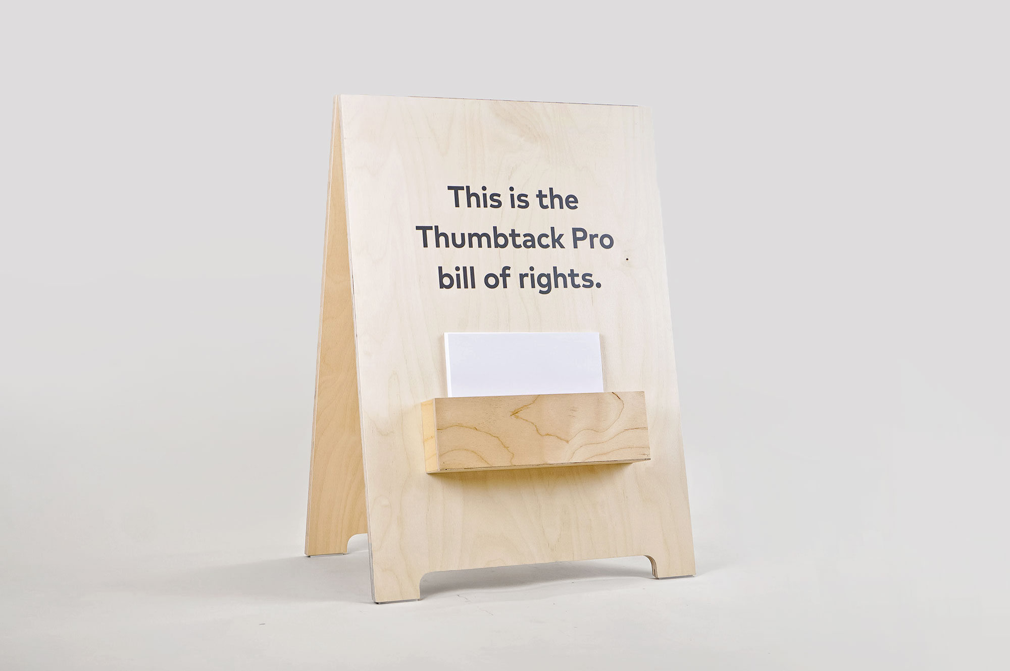 Light wood a-frame with brochure pocket for Thumbtack, an online service that matches customers with local professionals. Light wood a-frame with brochure pocket for Thumbtack, an online service that matches customers with local professionals.