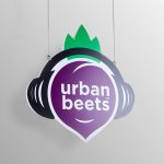 Hanging, full-color exterior sign for Urban Beets, a new restaurant in Arvada, CO.