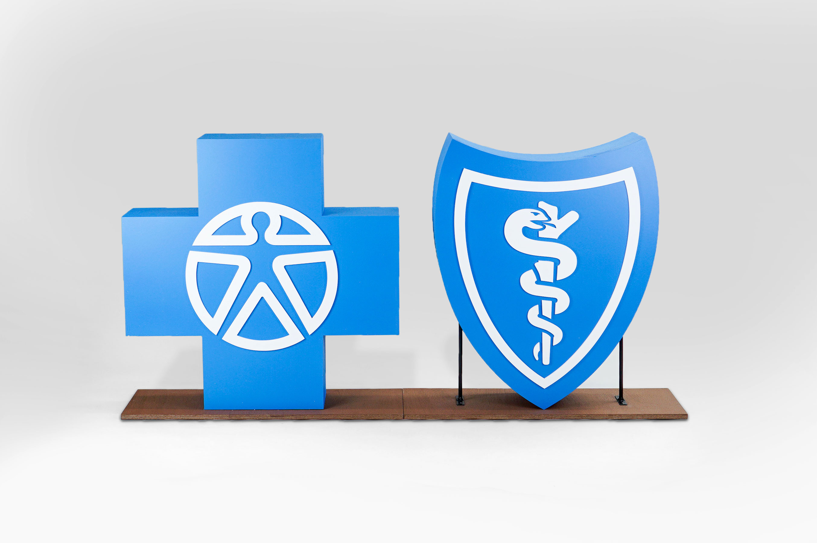 Large scale blue and white Blue Cross Blue Shield foam freestanding event logos for Aspen Event Works, a boutique event planning company specializing in creative and memorable event experiences.