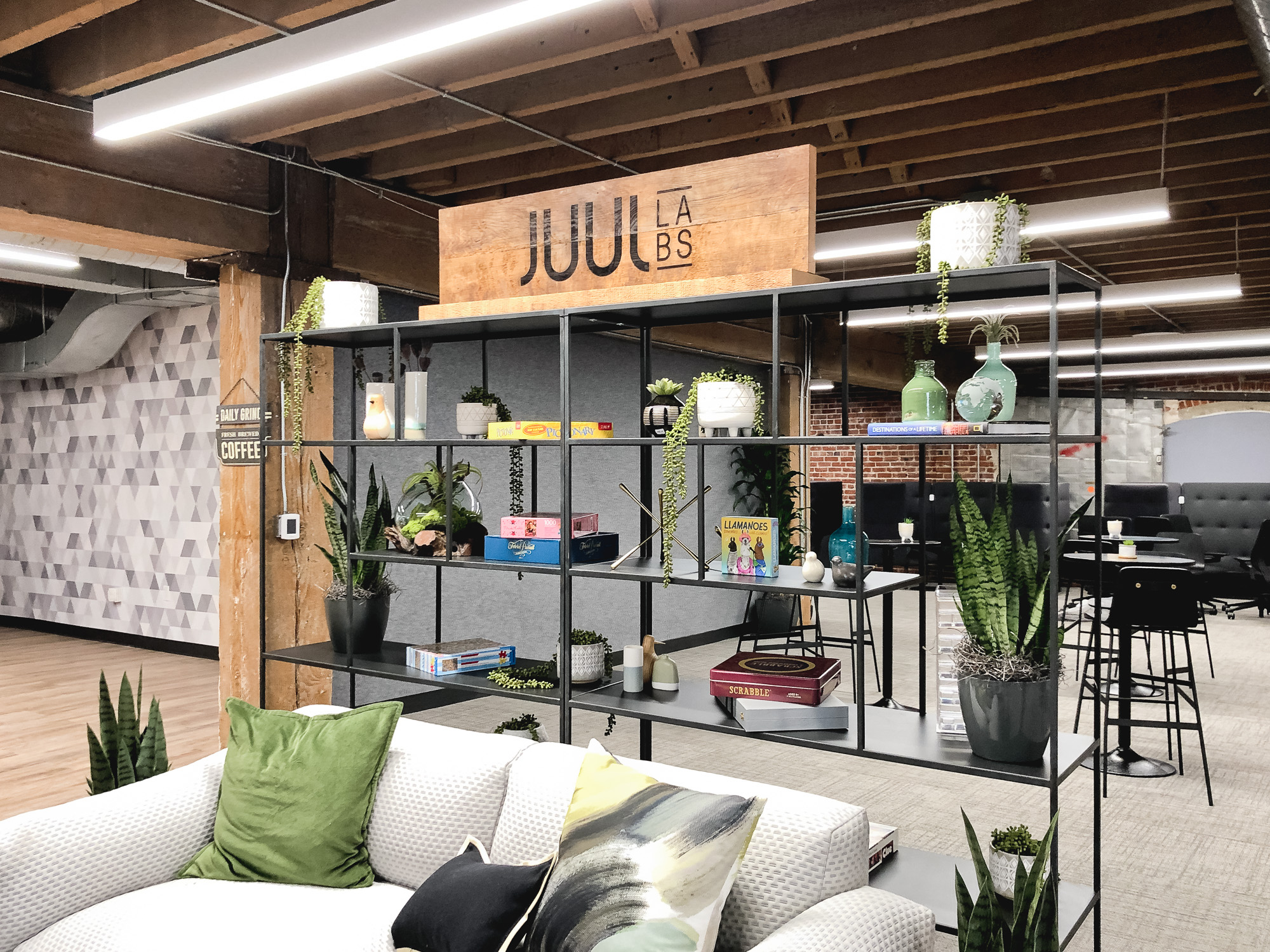 Reclaimed wood sign with etched logo on a shelf for the San Francisco office of Juul, an electronic cigarette company. Reclaimed wood sign with etched logo on a shelf for the San Francisco office of Juul, an electronic cigarette company.