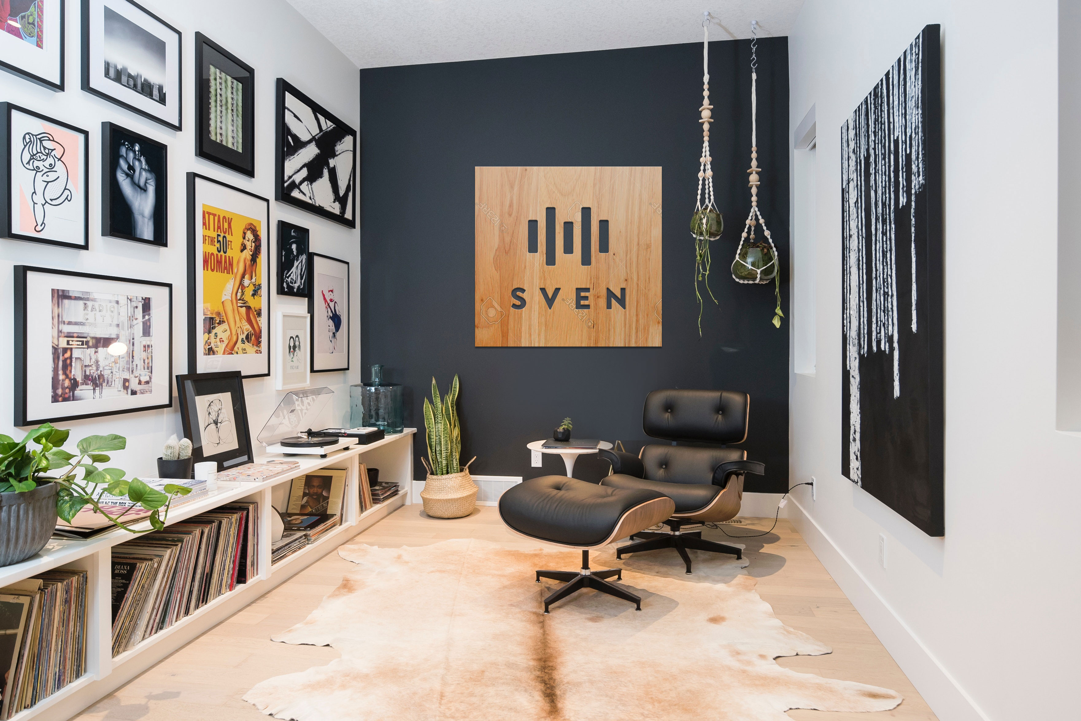 Solid light wood square logo on dark wall