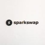Black painted acrylic logo on white wall for Sparkswap, the first cryptocurrency exchange built on the Lightning Network