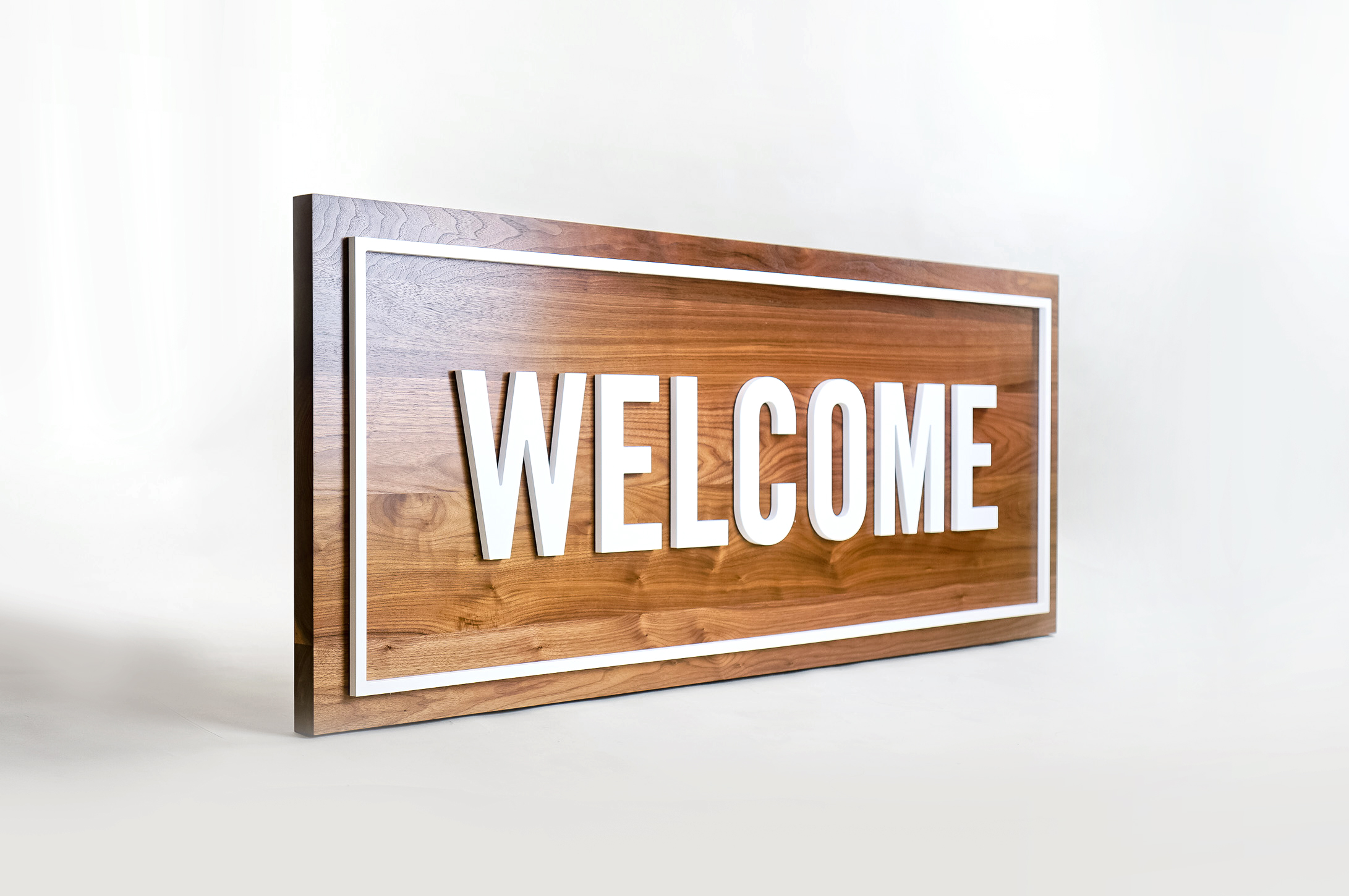 Solid walnut and white acrylic welcome sign for Columbia Church, a church in Richland, WA.