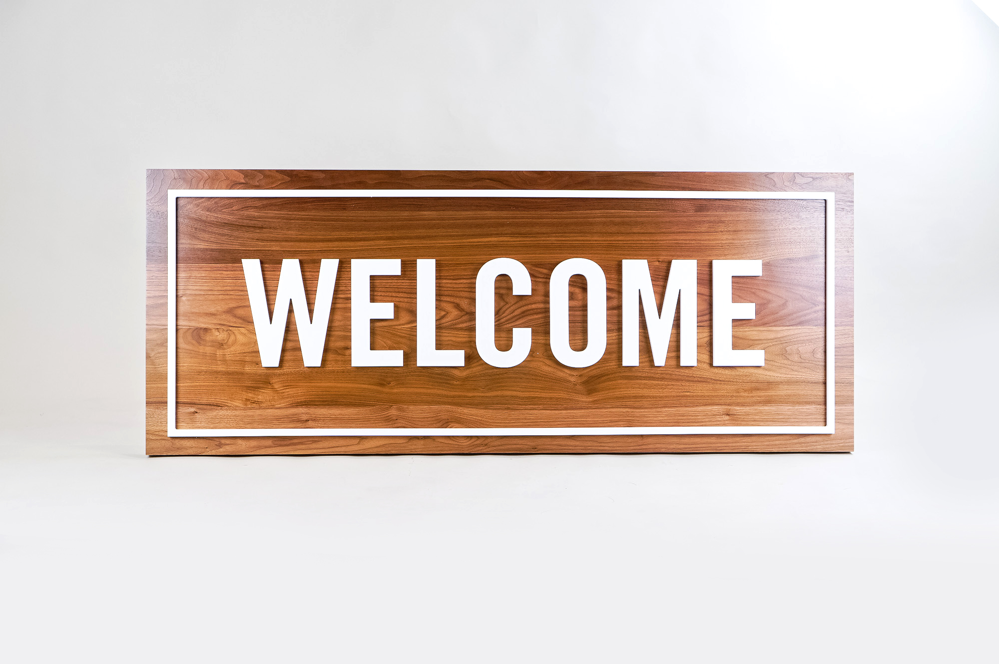 Solid walnut and white acrylic welcome sign for Columbia Church, a church in Richland, WA.