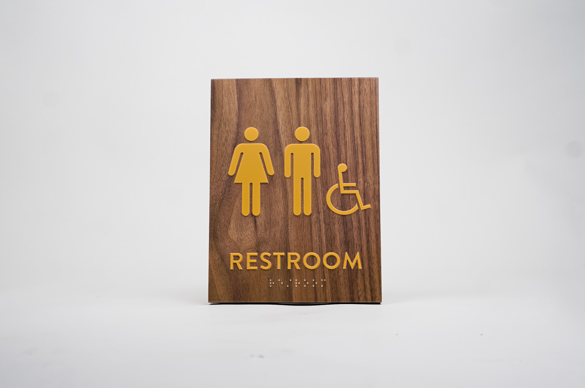 Gold and walnut wood ADA compliant restroom sign