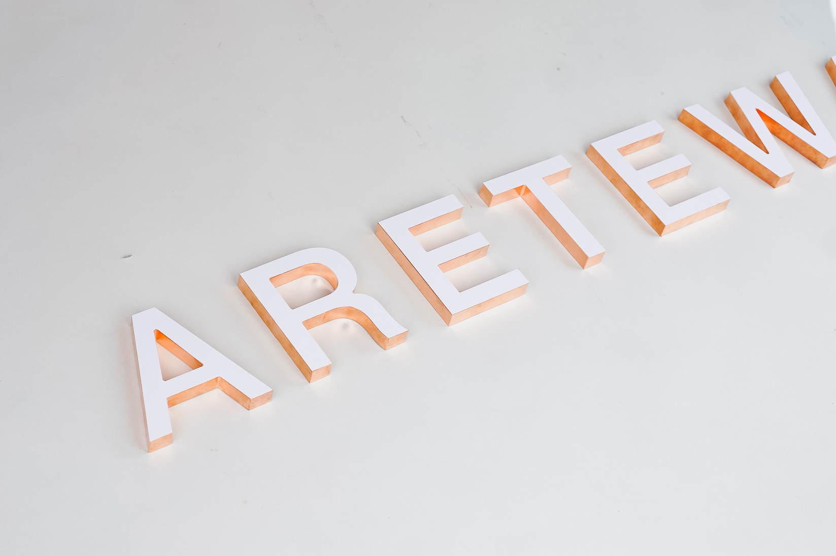 White letters with copper edges for Areteway, a clothing and gift boutique in Santa Rosa, CA. White letters with copper edges for Areteway, a clothing and gift boutique in Santa Rosa, CA.