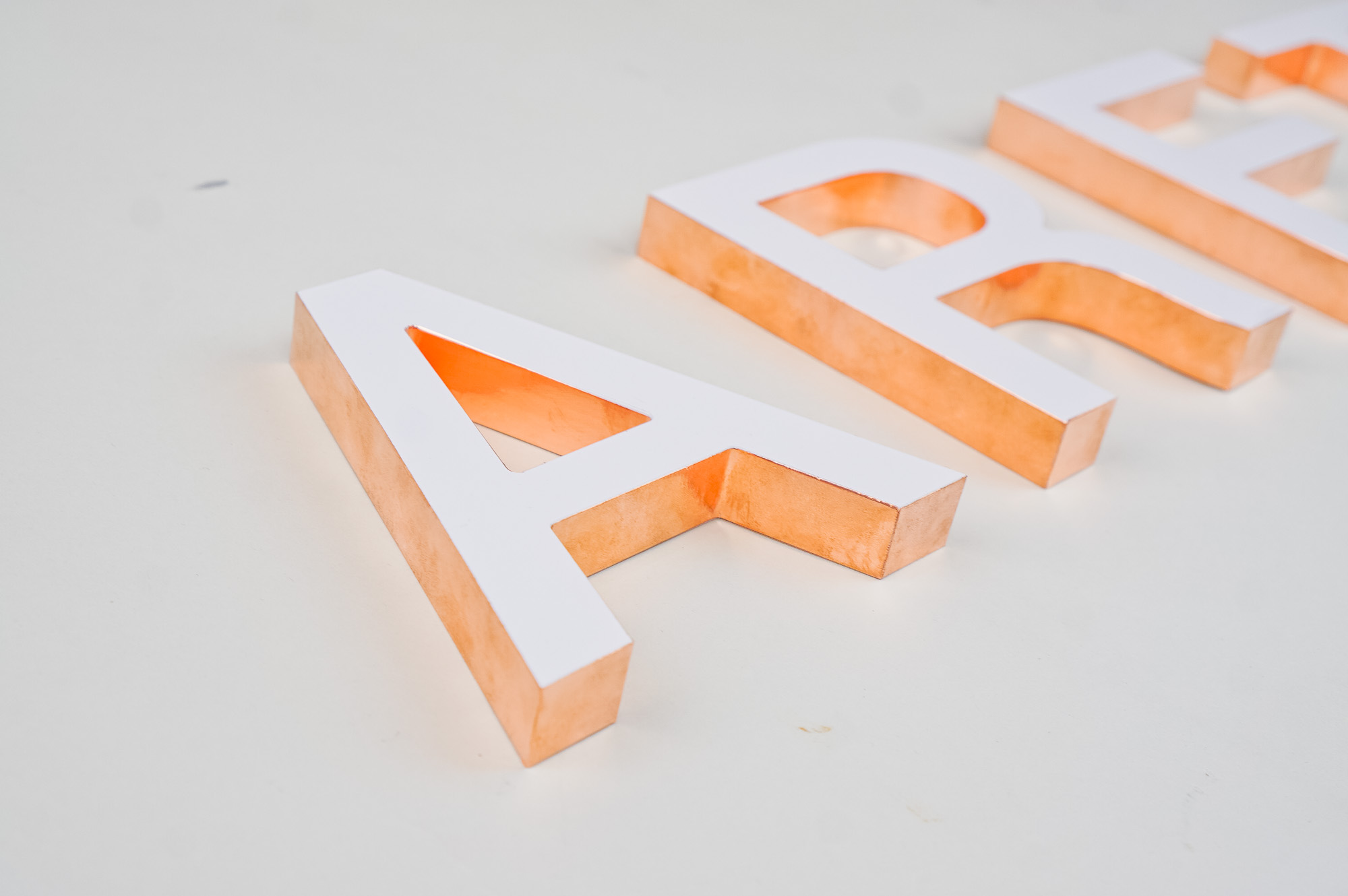 White letters with copper edges for Areteway, a clothing and gift boutique in Santa Rosa, CA. White letters with copper edges for Areteway, a clothing and gift boutique in Santa Rosa, CA.