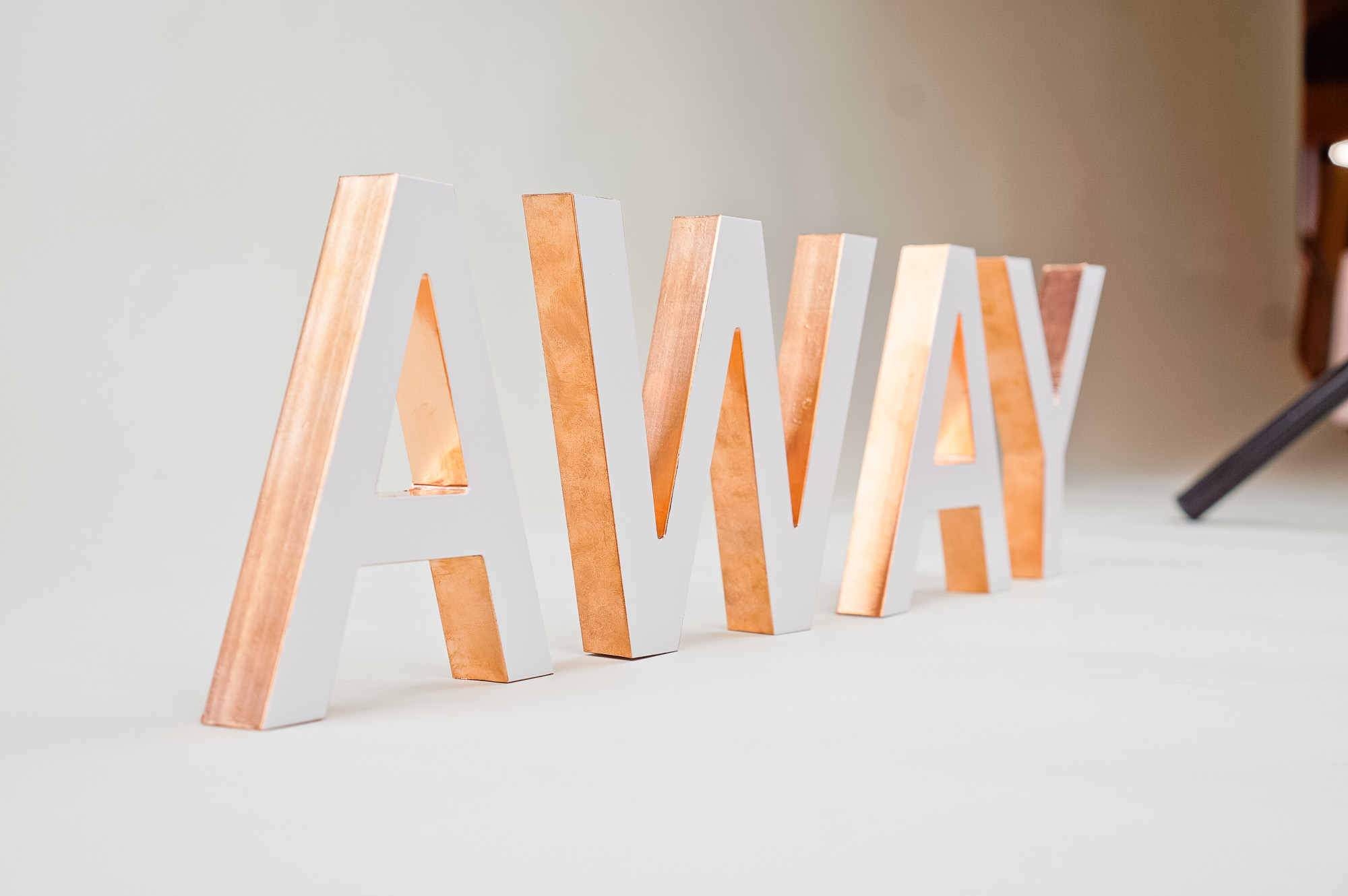 White letters with copper edges for Areteway, a clothing and gift boutique in Santa Rosa, CA.