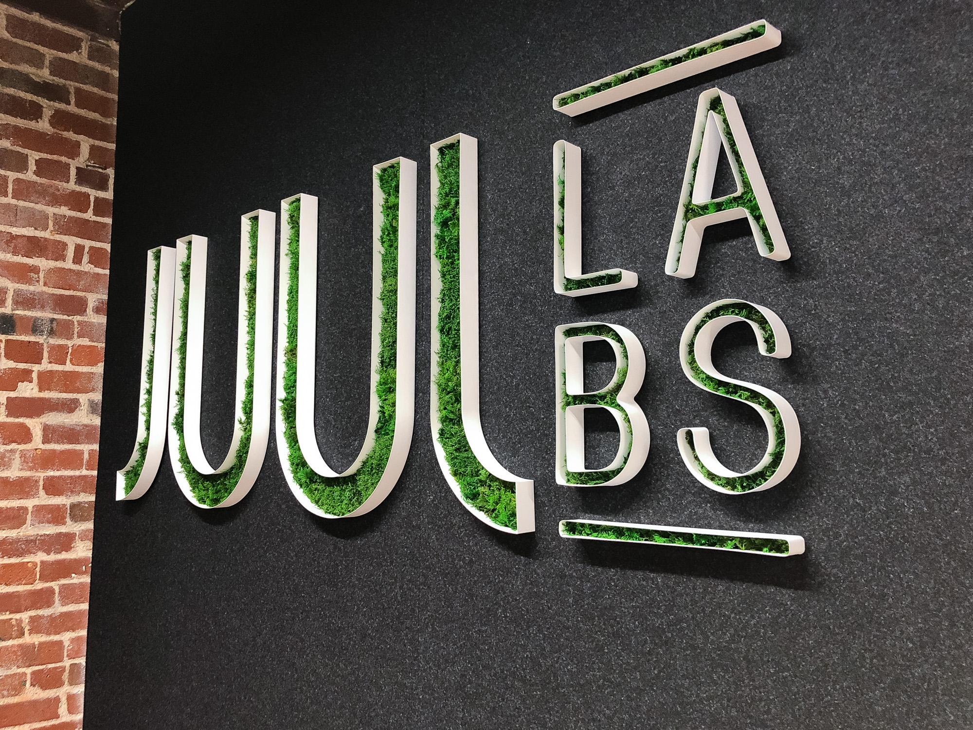 Moss filled lobby sign for the San Francisco office of Juul, an electronic cigarette company. Moss filled lobby sign for the San Francisco office of Juul, an electronic cigarette company.