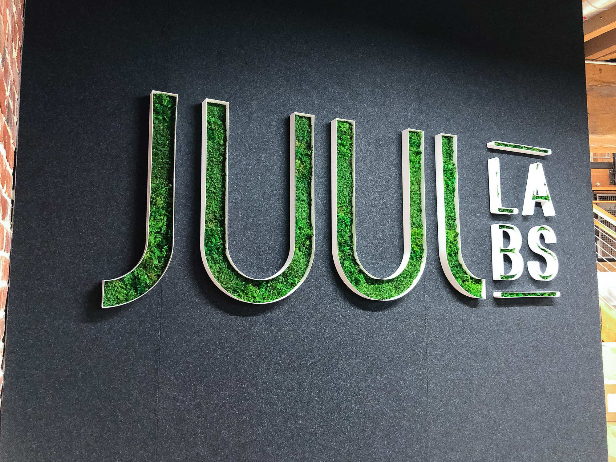 Moss filled lobby sign for the San Francisco office of Juul, an electronic cigarette company. Moss filled lobby sign for the San Francisco office of Juul, an electronic cigarette company.
