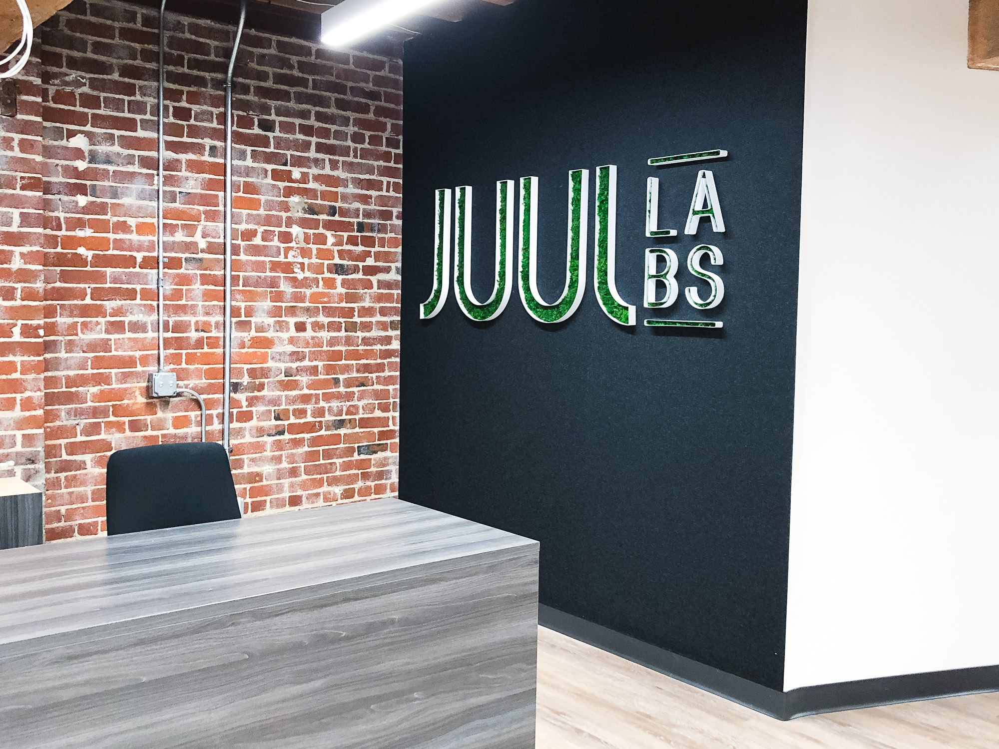Moss filled lobby sign for the San Francisco office of Juul, an electronic cigarette company. Moss filled lobby sign for the San Francisco office of Juul, an electronic cigarette company.