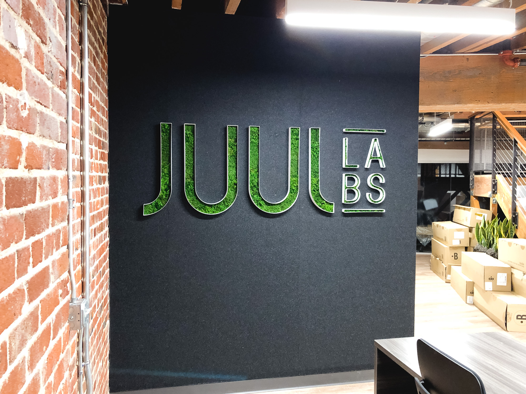 Moss filled lobby sign for the San Francisco office of Juul, an electronic cigarette company. Moss filled lobby sign for the San Francisco office of Juul, an electronic cigarette company.
