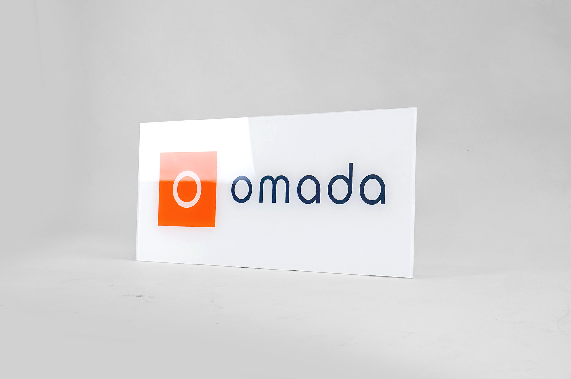 Glass-like, printed panel sign for Omada Health, a San Francisco based company pioneering digital behavioral medicine. Glass-like, printed panel sign for Omada Health, a San Francisco based company pioneering digital behavioral medicine.