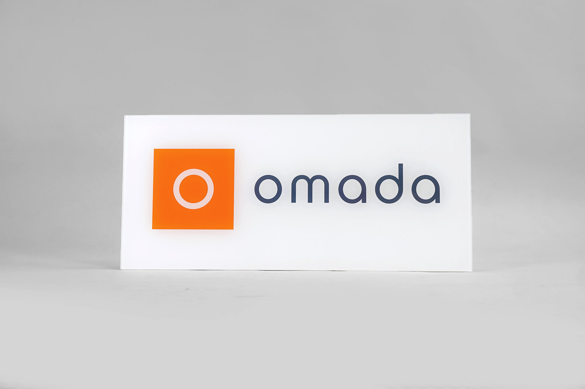 Glass-like, printed panel sign for Omada Health, a San Francisco based company pioneering digital behavioral medicine.