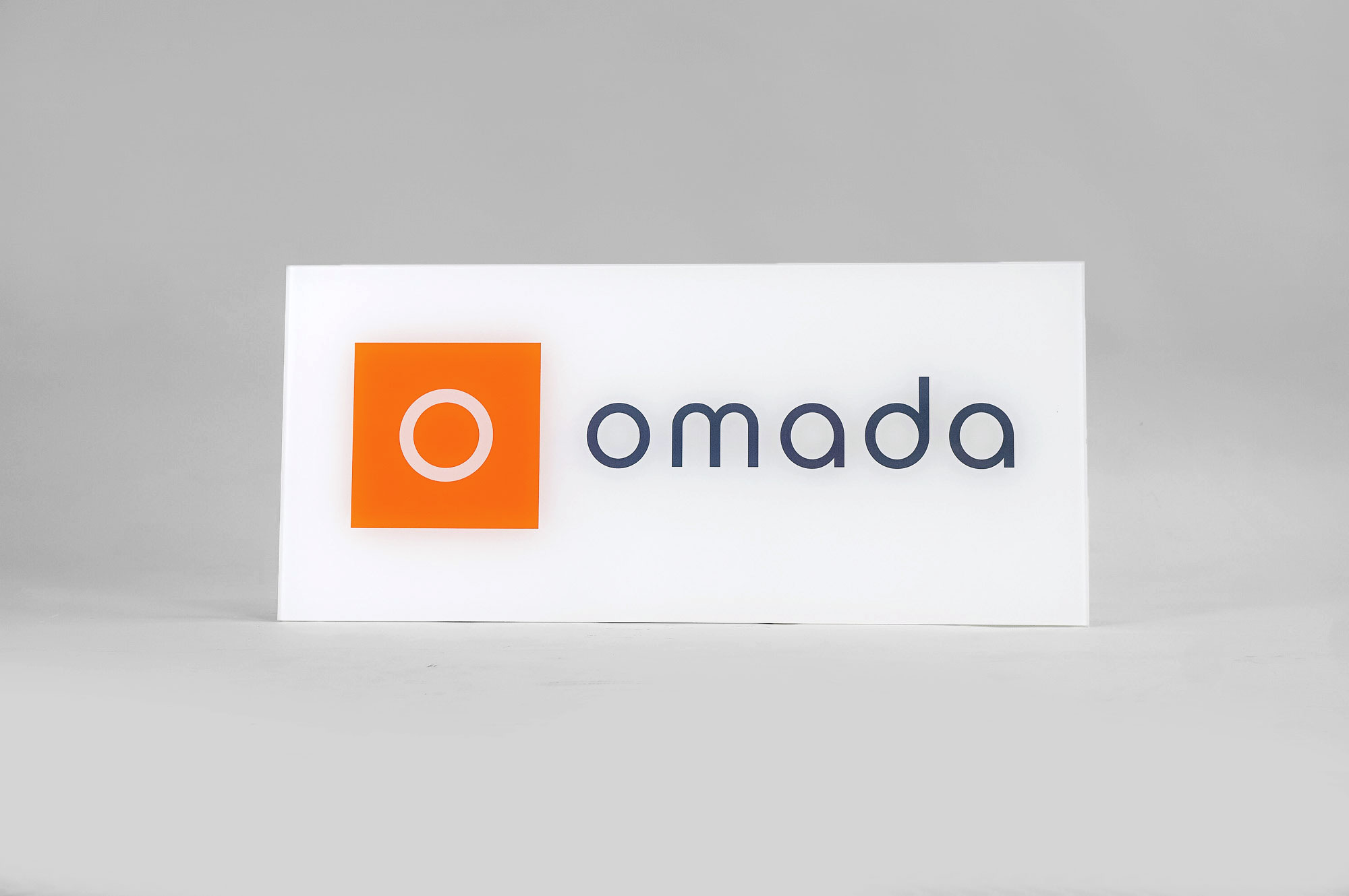 Glass-like, printed panel sign for Omada Health, a San Francisco based company pioneering digital behavioral medicine. Glass-like, printed panel sign for Omada Health, a San Francisco based company pioneering digital behavioral medicine.