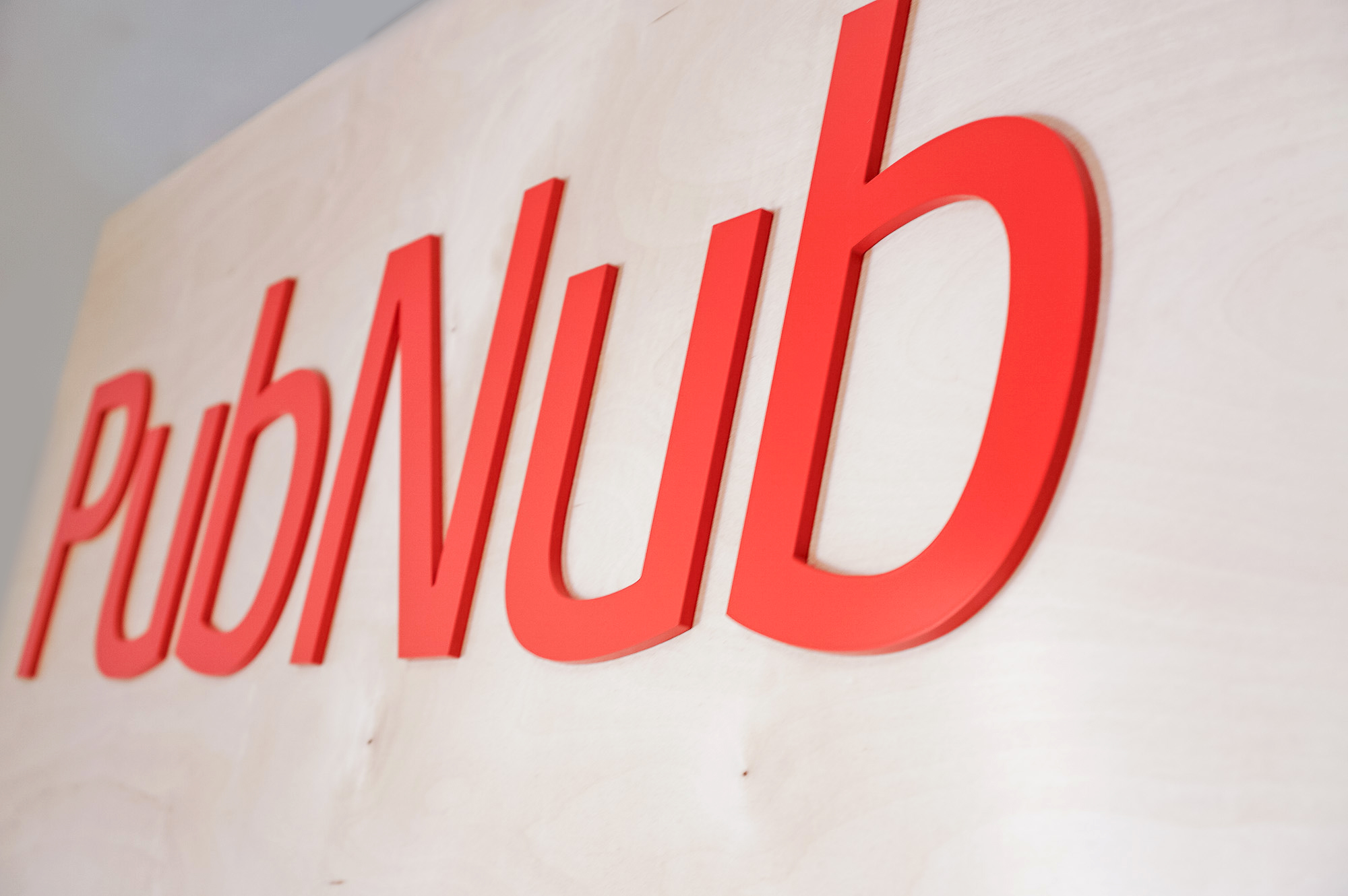 Light wood sign with red letters for PubNub, a global Data Stream Network and realtime infrastructure-as-a-service company based in San Francisco, California. Light wood sign with red letters for PubNub, a global Data Stream Network and realtime infrastructure-as-a-service company based in San Francisco, California.